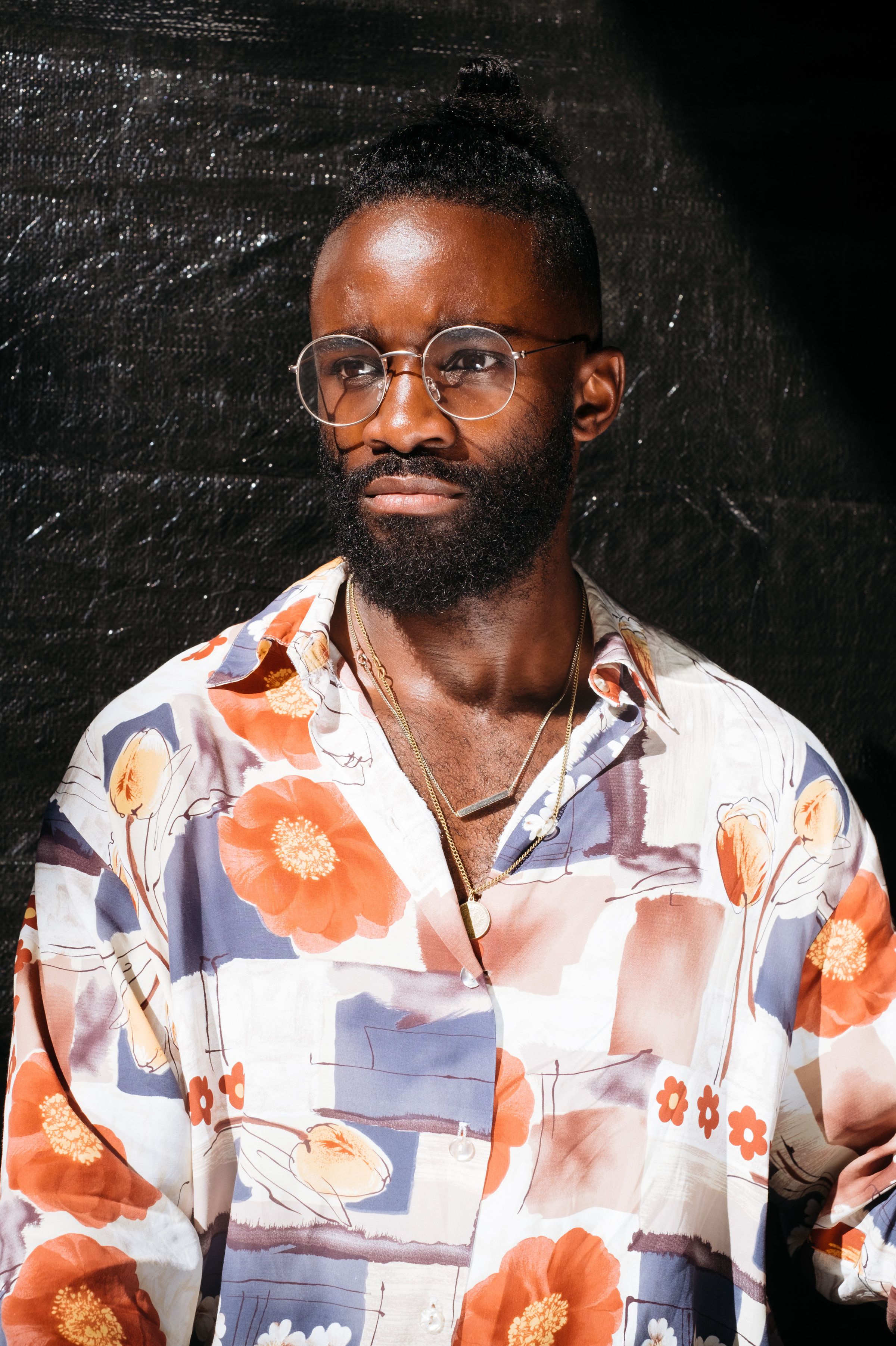 German fashion stylist Cedric, 29, planned on bringing home his experience at Afropunk Fest Paris 2017. "I'm so proud of my color and now I am more proud. I am sad it is finished, but every good thing finishes. Now we are going to do this in Germany." Image by Melissa Bunni Elian. South Africa, 2017.