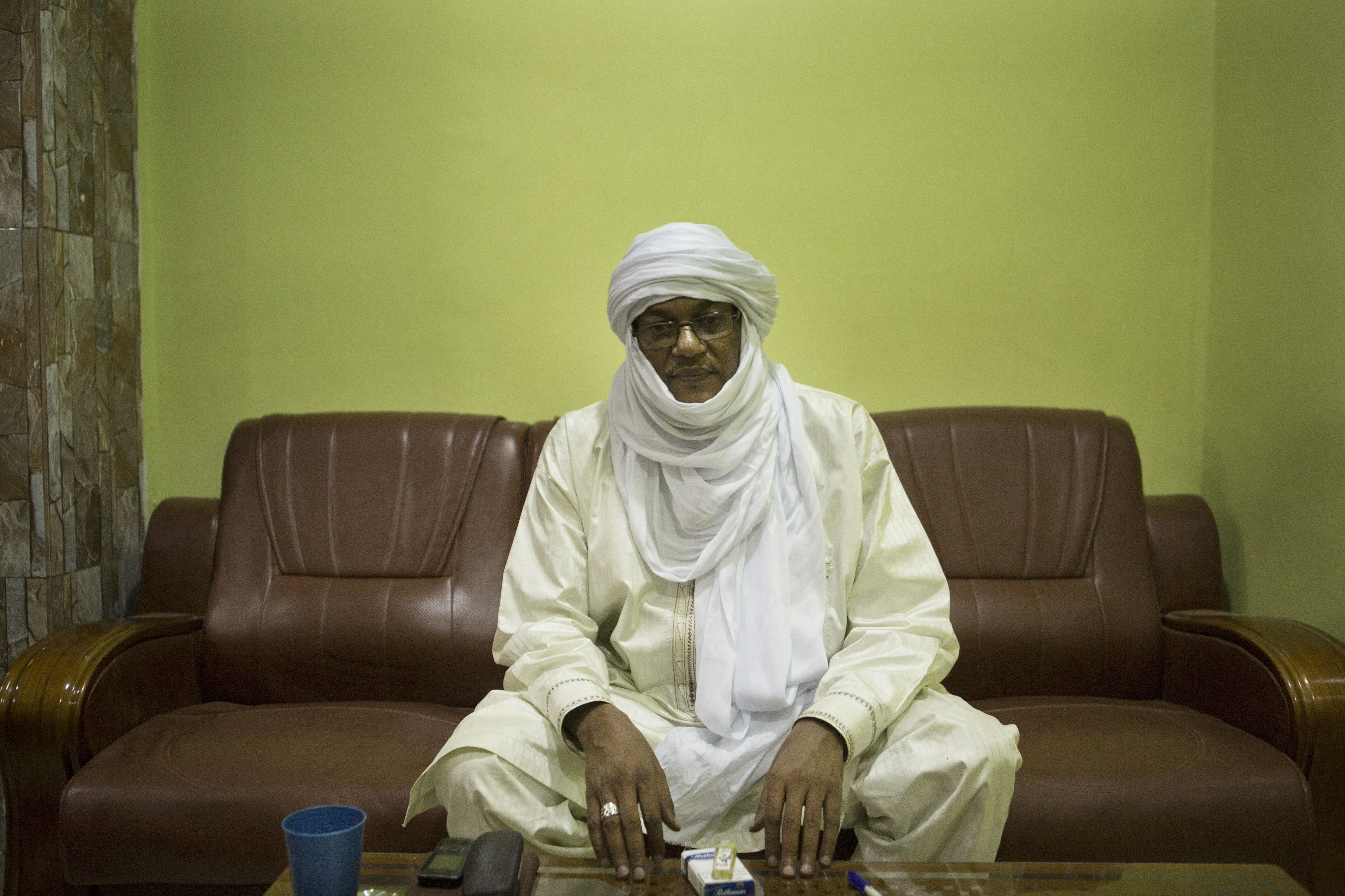 Mohamed Anacko, president of the Regional Council of Agadez, poses for a picture in his office in Niamey, Niger, Jan. 10, 2018. Image by Joe Penney. Niger, 2018.