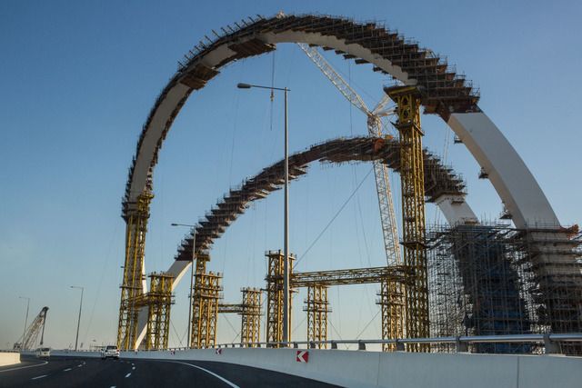The Al Wahda arch serves as the gateway to Doha's West Bay business district. Image by OM. Qatar, 2017.