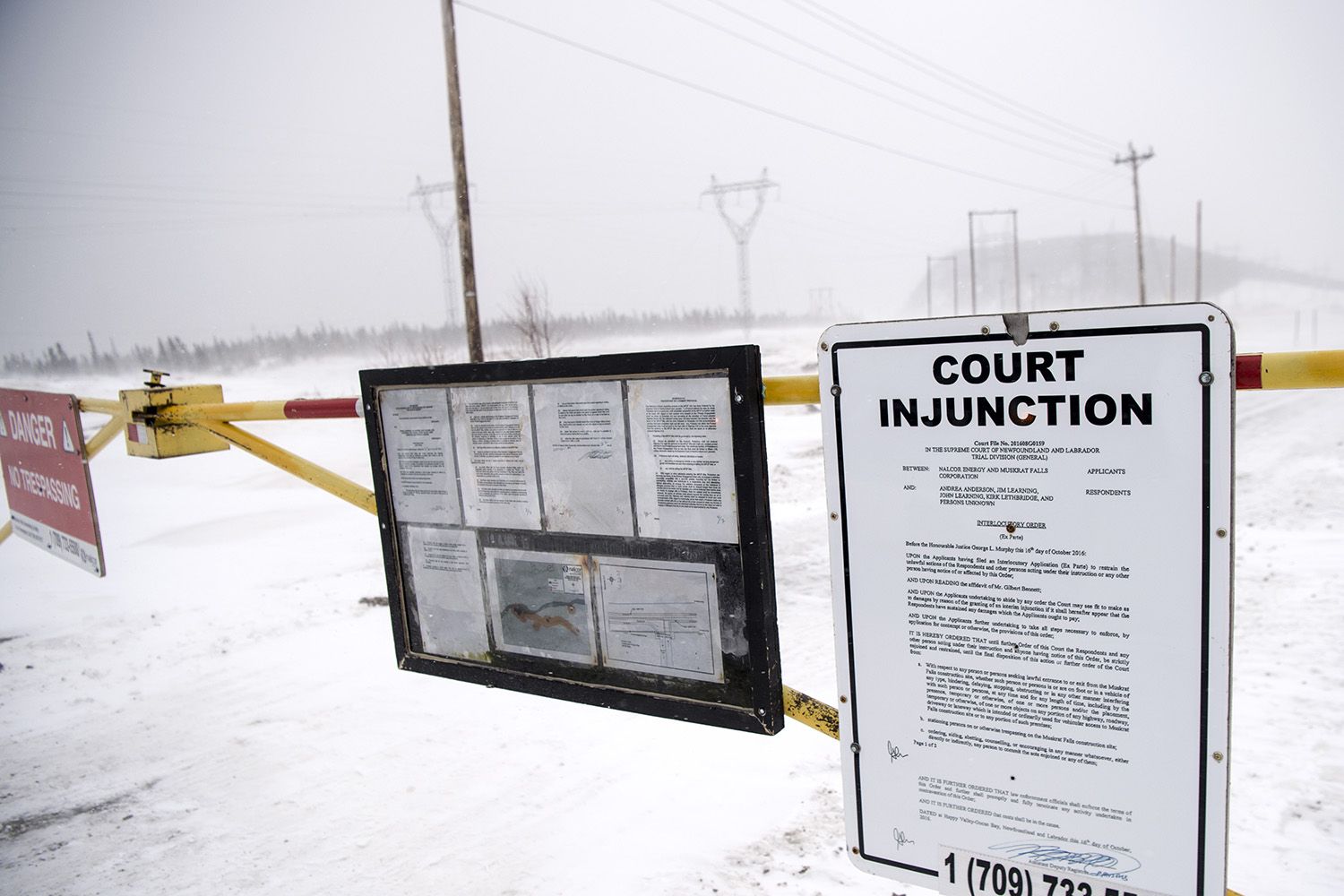 Signs warn protesters at the gate to Muskrat Falls Generating Facility, the site where Learning and Davis were arrested, on Nov. 16, 2019. Image by Michael G. Seamans. Canada, 2019.