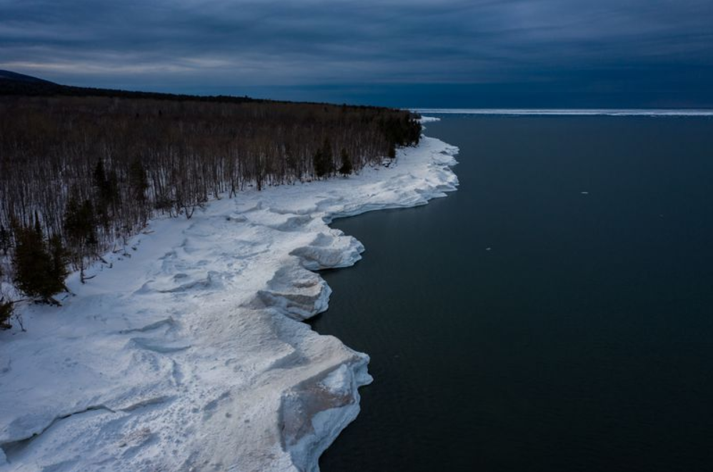 Open water of Lake Superior is shown near the shoreline at the Porcupine Mountains Wilderness State Park, in Ontonagon, Michigan, on Feb. 17, 2020. Image by Zbigniew Bzdak/The Chicago Tribune.