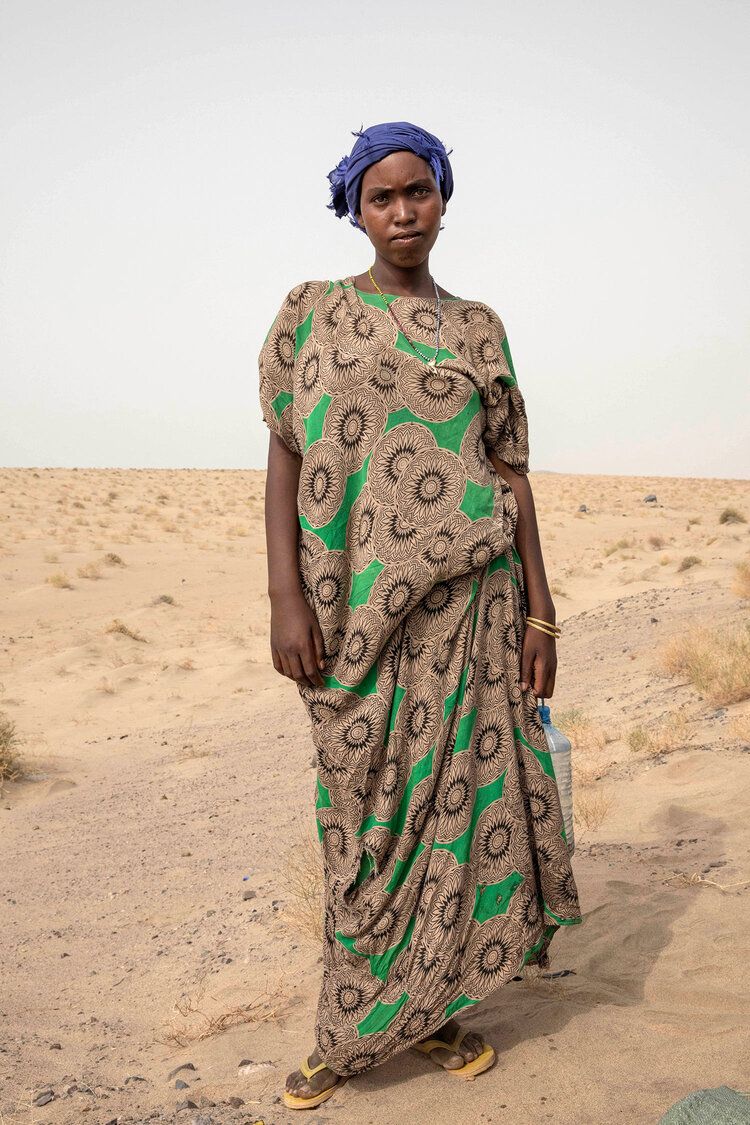 This July 22, 2019 photo shows Fatmah Mohammed from Ethiopia on the road towards Aden, Yemen. Image by Nariman El-Mofty / AP Photo. Yemen, 2019.