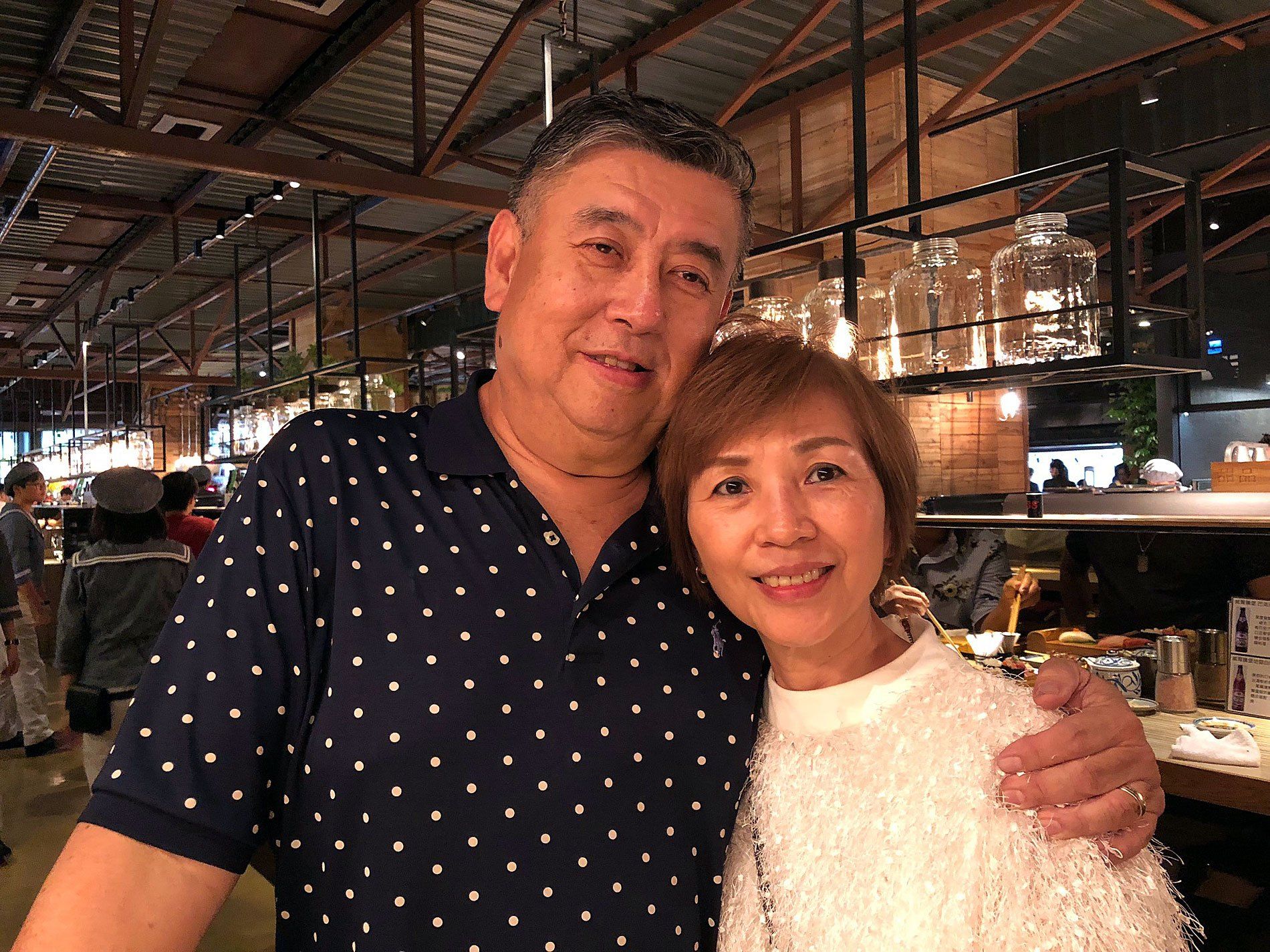 Mike Chen and his wife, Grace, shopped in Addiction Aquatic Development, a Taipei a food hall. Image by Melissa McCart. Taiwan, 2018. 