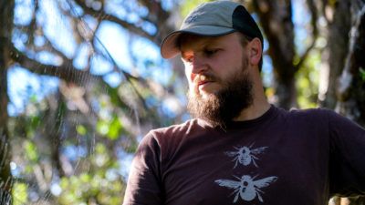 Chris Warren of the Maui Forest Bird Recovery Project balances raising a family with saving endangered species. Image by Nathan Eagle. United States, 2019.