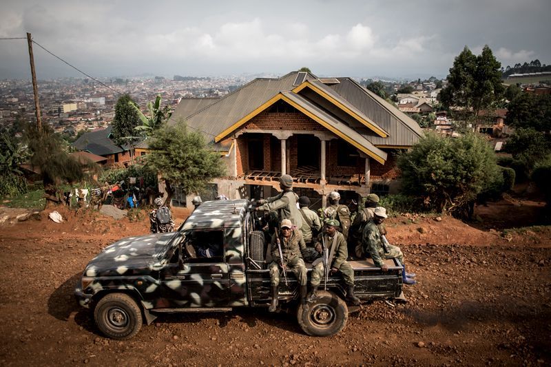Soldiers patrol Butembo, a northeastern city in the DRC racked by conflict and Ebola. Image by John Wessels. Democratic Republic of Congo, 2019.
