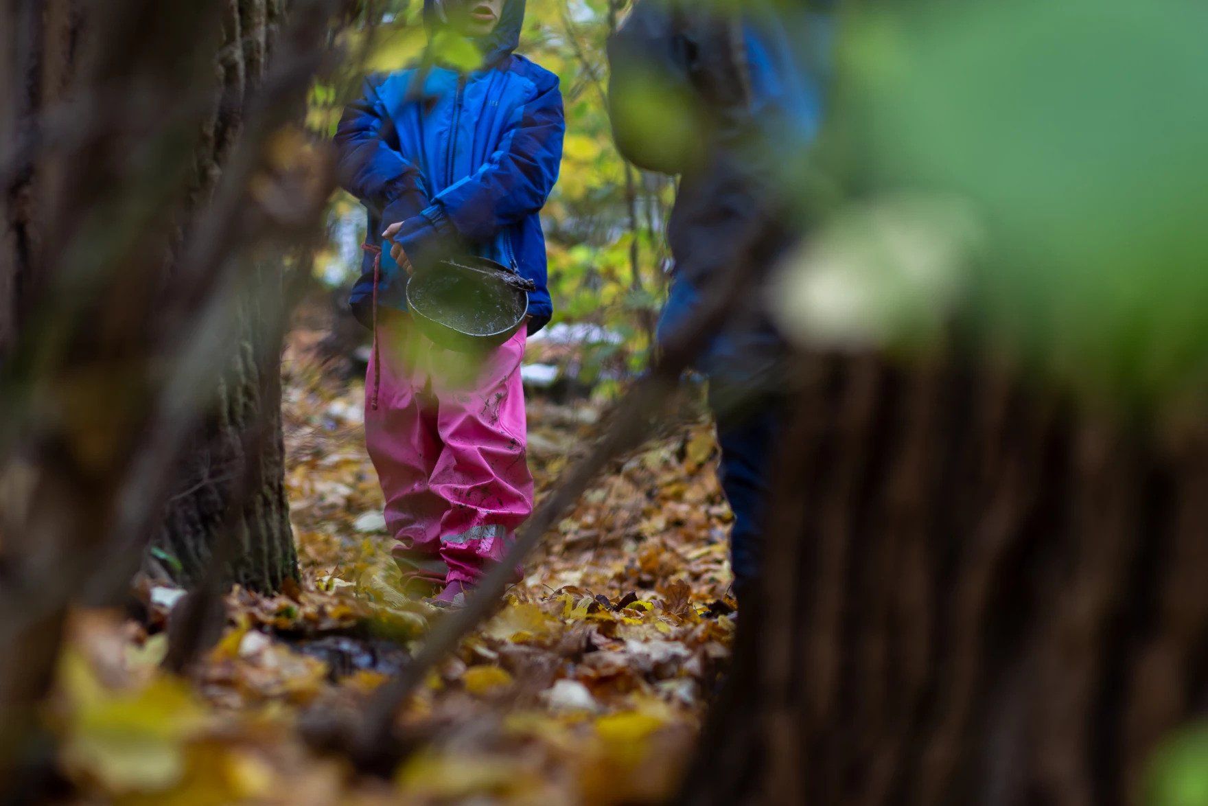 Parents and educators say layers and lots of warm clothes — and rain pants — are the key to enjoying a nature-based learning experience. Image by Ryan Delaney. Germany, 2020.
