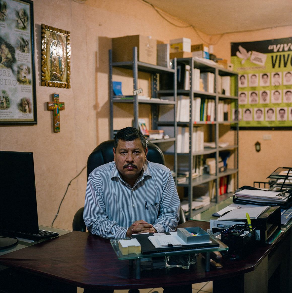 Raymundo Ramos Vázquez, the director of the Human Rights Committee of Nuevo Laredo, inside of his office. Image by by Christopher Lee. Mexico, 2020.