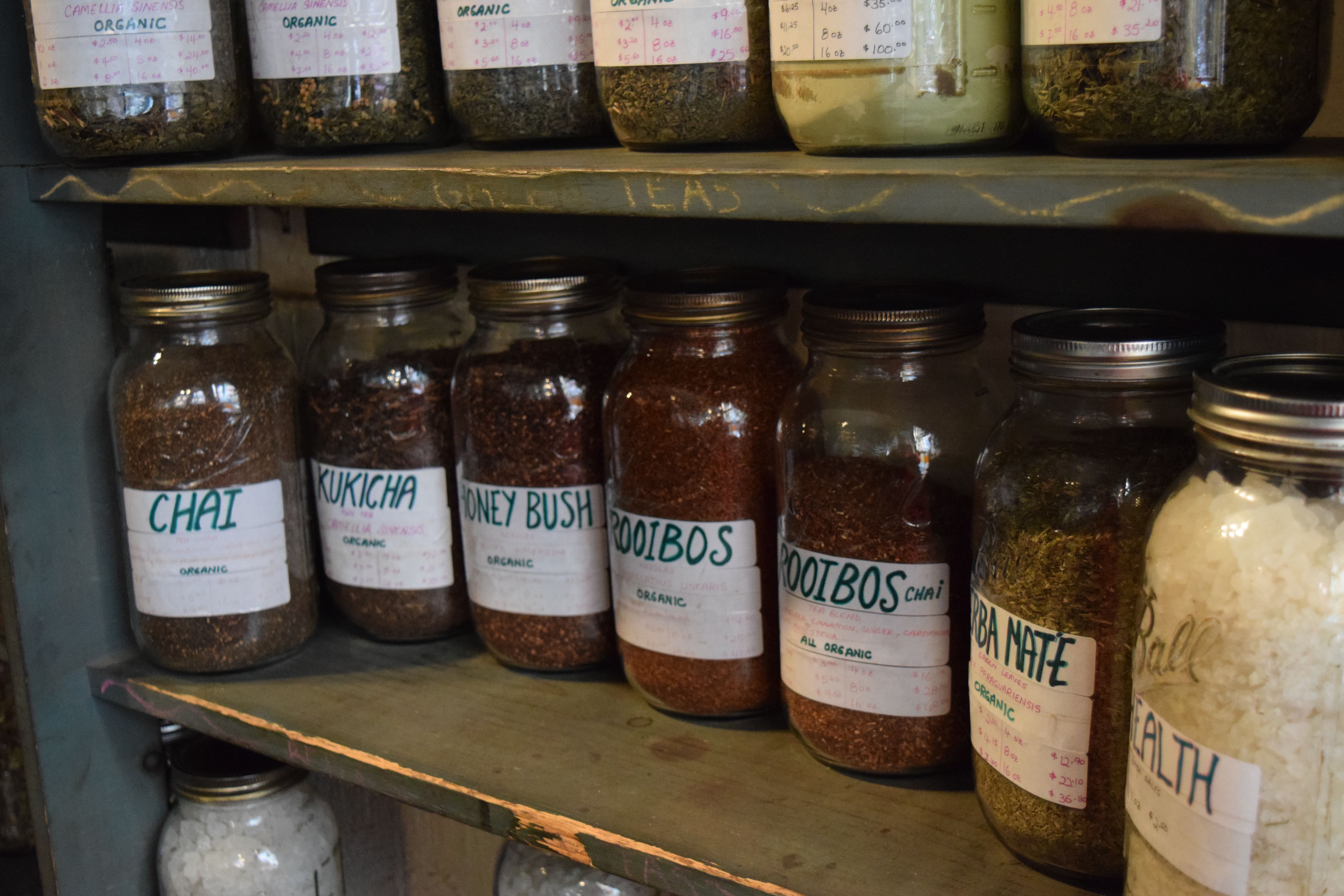 Herbs in jars at Flower Power Herbs. Image by Claire Hogan. United States, 2019