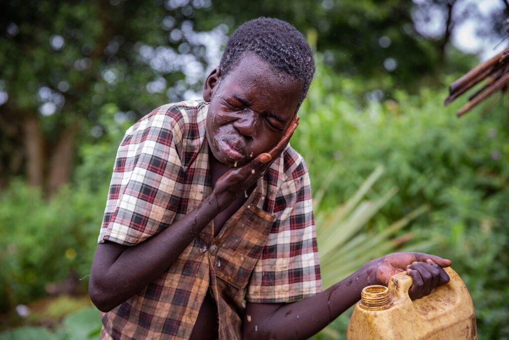 Walter Ochora was diagnosed in 2009 and was started on treatment right away. Image by Esther Ruth Mbabazi. Uganda, 2019. 