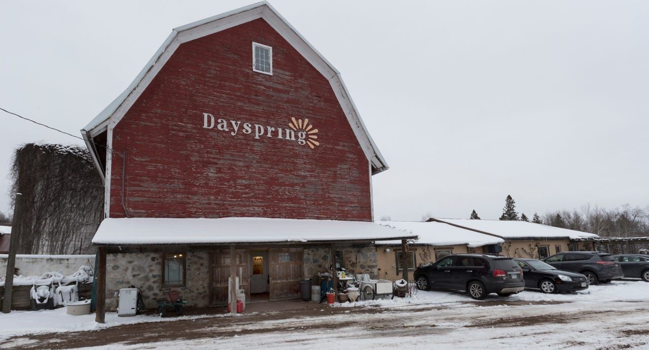 The lower level of this dairy barn where cow stalls used to be is now used for wine tastings and a store at Munson Bridge Winery. Image by Mark Hoffman. United States, 2019.