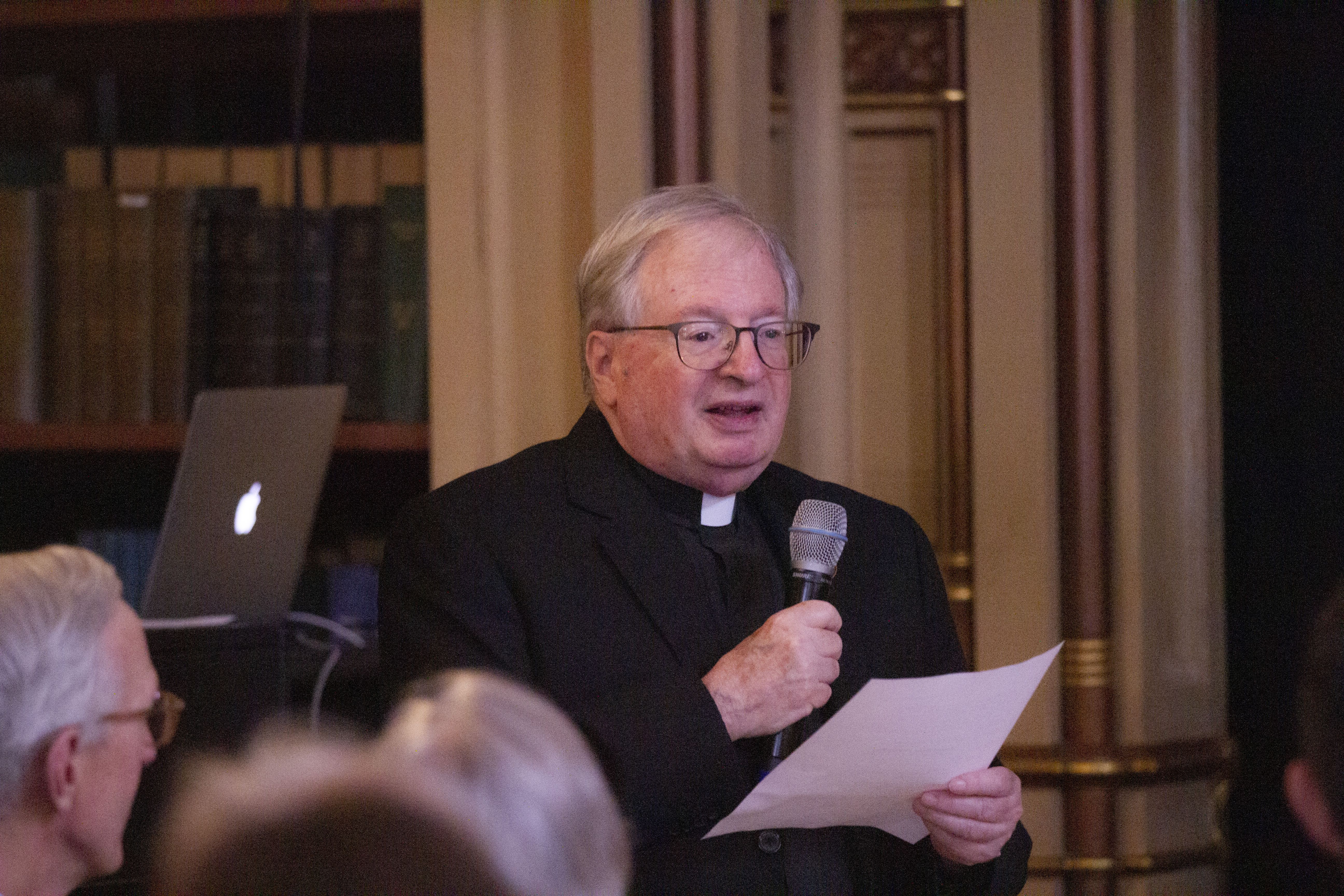 Father Drew Christiansen, professor of ethics and human development at Georgetown’s School of Foreign Service, offered a prayer at Friday's dinner for the safety of journalists around the world working to expose the truth. Image by Jin Ding. United States, 2019.