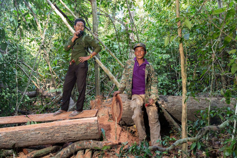Members of the Prey Lang Community Rangers monitoring illegal logging. Prey Lang is one of Asia's last remaining lowland evergreen woodlands. Image by Sean Gallagher. Cambodia, 2020.
