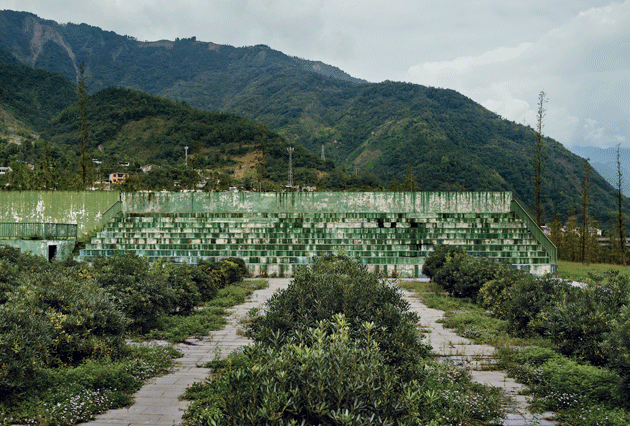 The spectator stands of the Beichuan Middle School. Hundreds of students were killed after the school building collapsed. Image by Sim Chi Yin/VII Photo. China, 2015.