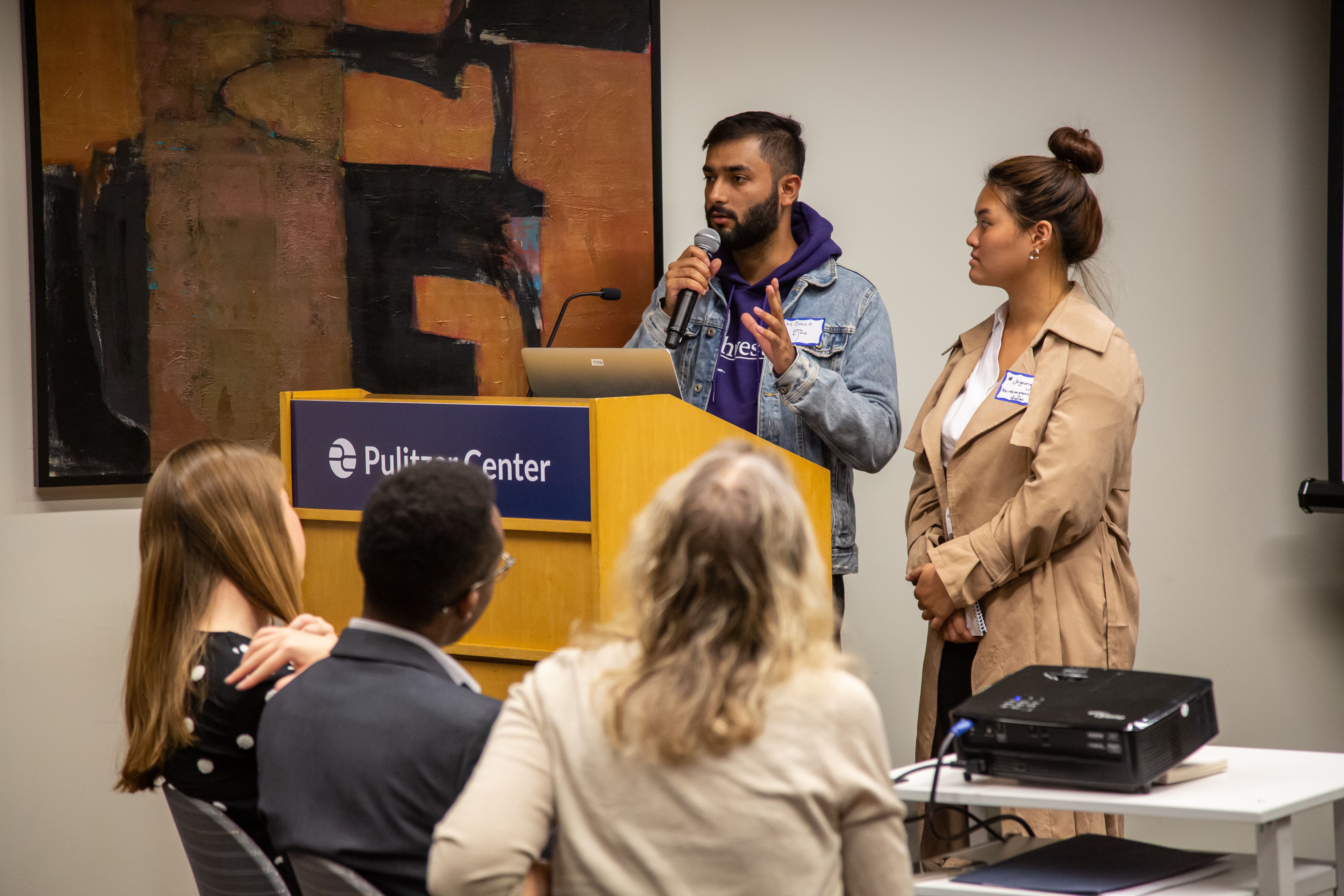 Saad Ejaz and Juyoung Choi (Northwestern University in Qatar) share stories of Yemeni refugees in South Korea on Day One of Washington Weekend. Image by Claire Seaton. United States, 2019.