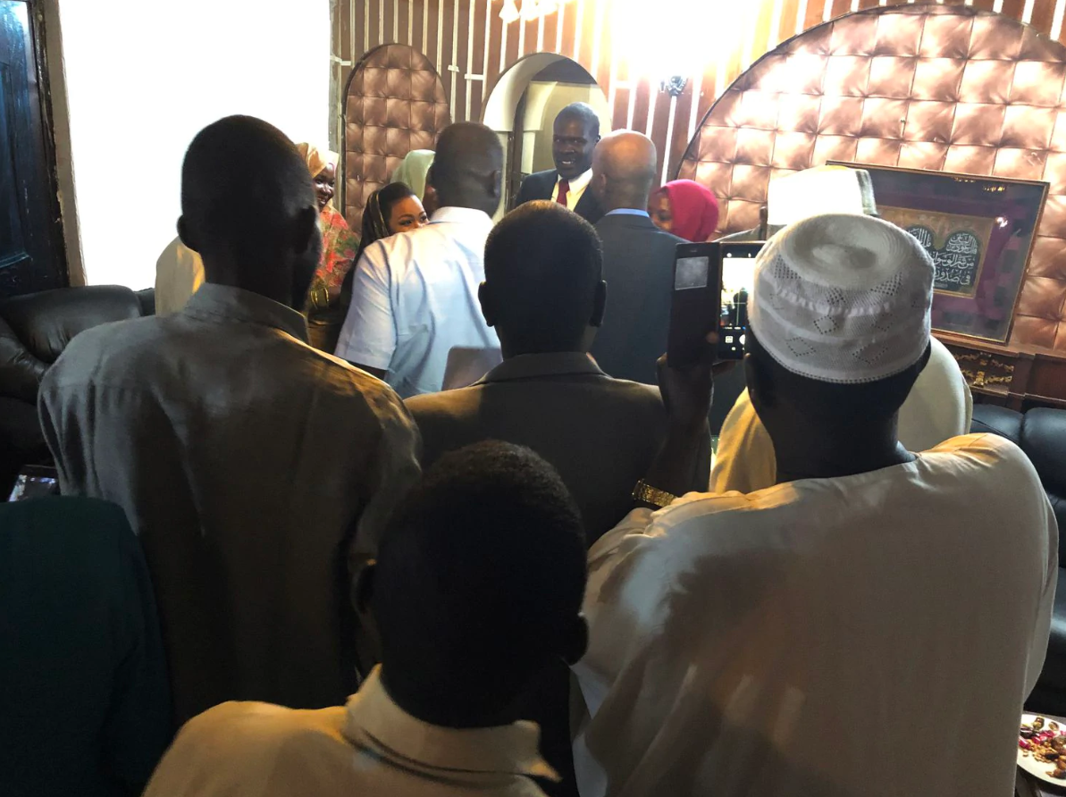 A crowd gathers to get a photo of Abdulbari after a speech in Khartoum. Image by Rebecca Hamilton. Sudan, 2019.