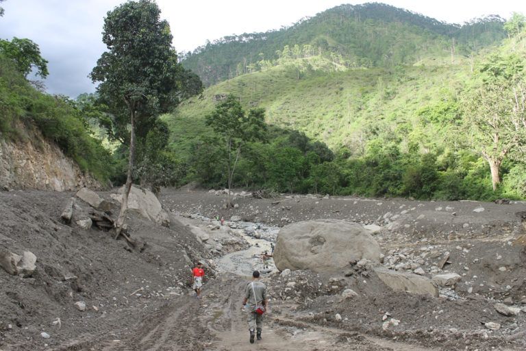 On August 6, 2019, a flash flood caused by an intense monsoon event swept through a side stream of the main Punatsangchhu River in the district of Wangdue Phodrang. The flood took down bridges, houses, rice paddies, and a hydropower equipment storehouse. Image by Emma Johnson. Bhutan, 2019.