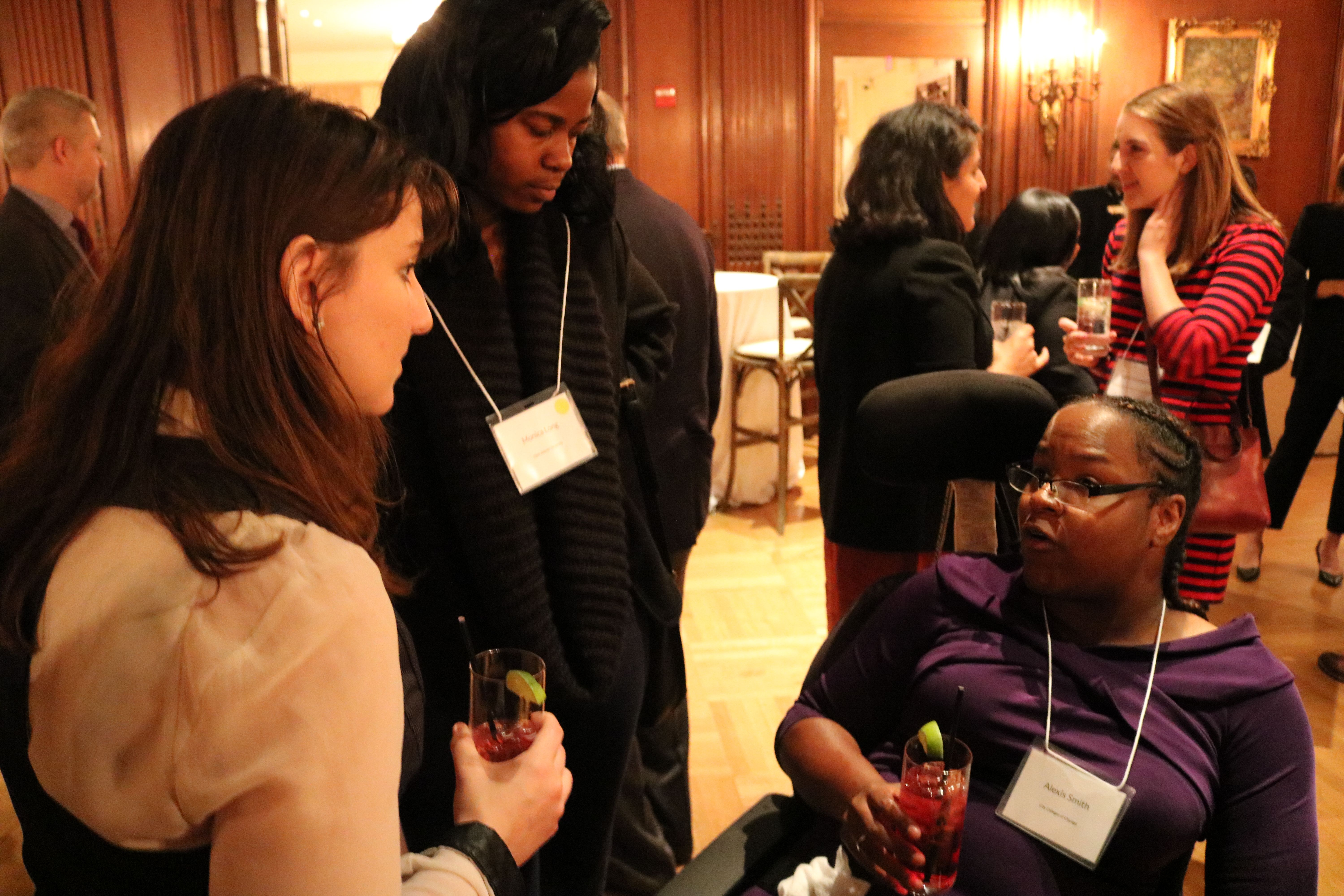 Student fellows Amanda Gordon, Monica Long, and Alexis Smith talk before the evening dinner. Image by Karena Phan. United States, 2018.