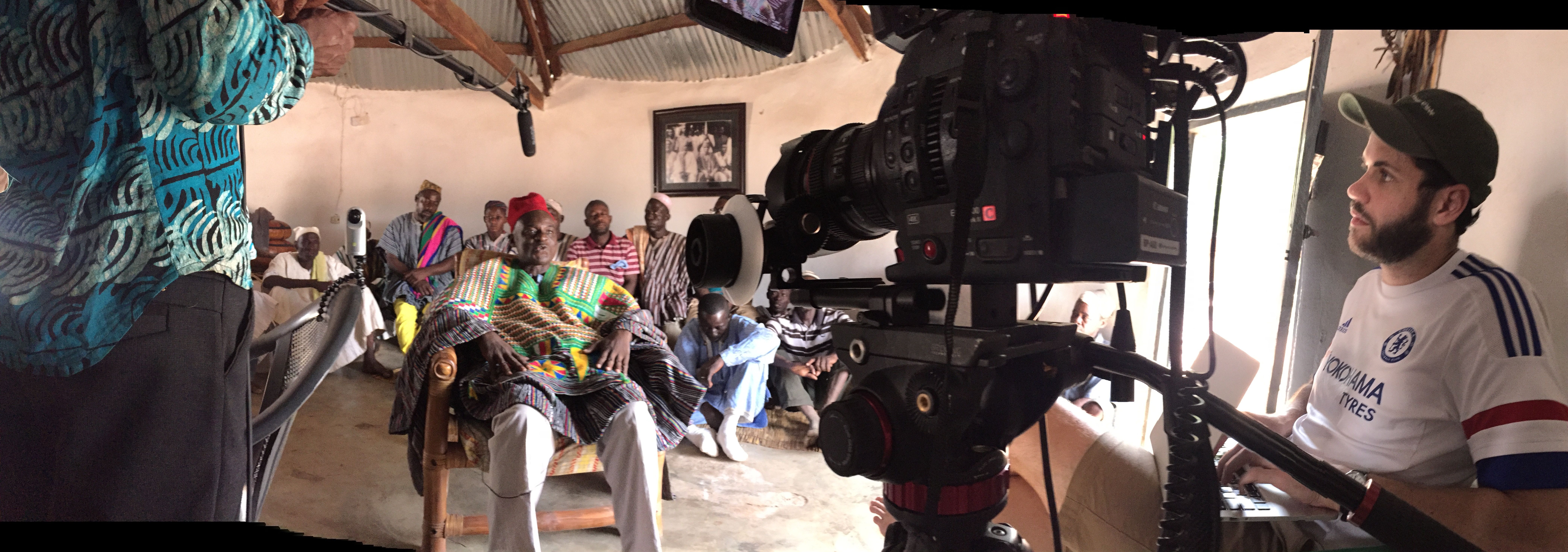 Jonathan Kaiman interviews Chief Wumbe in his palace, surrounded by assemblymen from Bunbong. Image by Noah Fowler. Ghana, 2017.