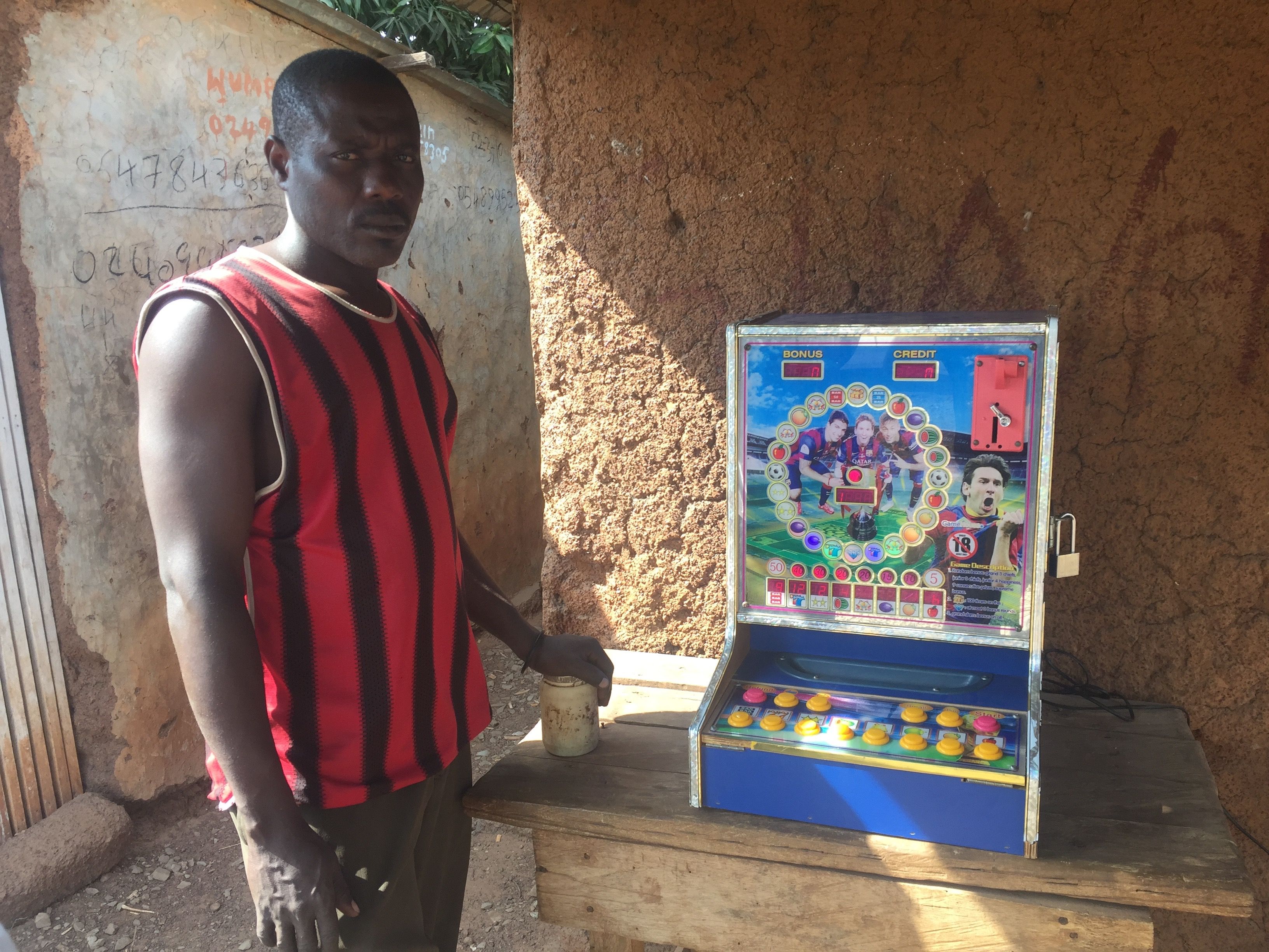 A gambling machine at a roadside shop in Yendi District. Image by Noah Fowler. Ghana, 2017.