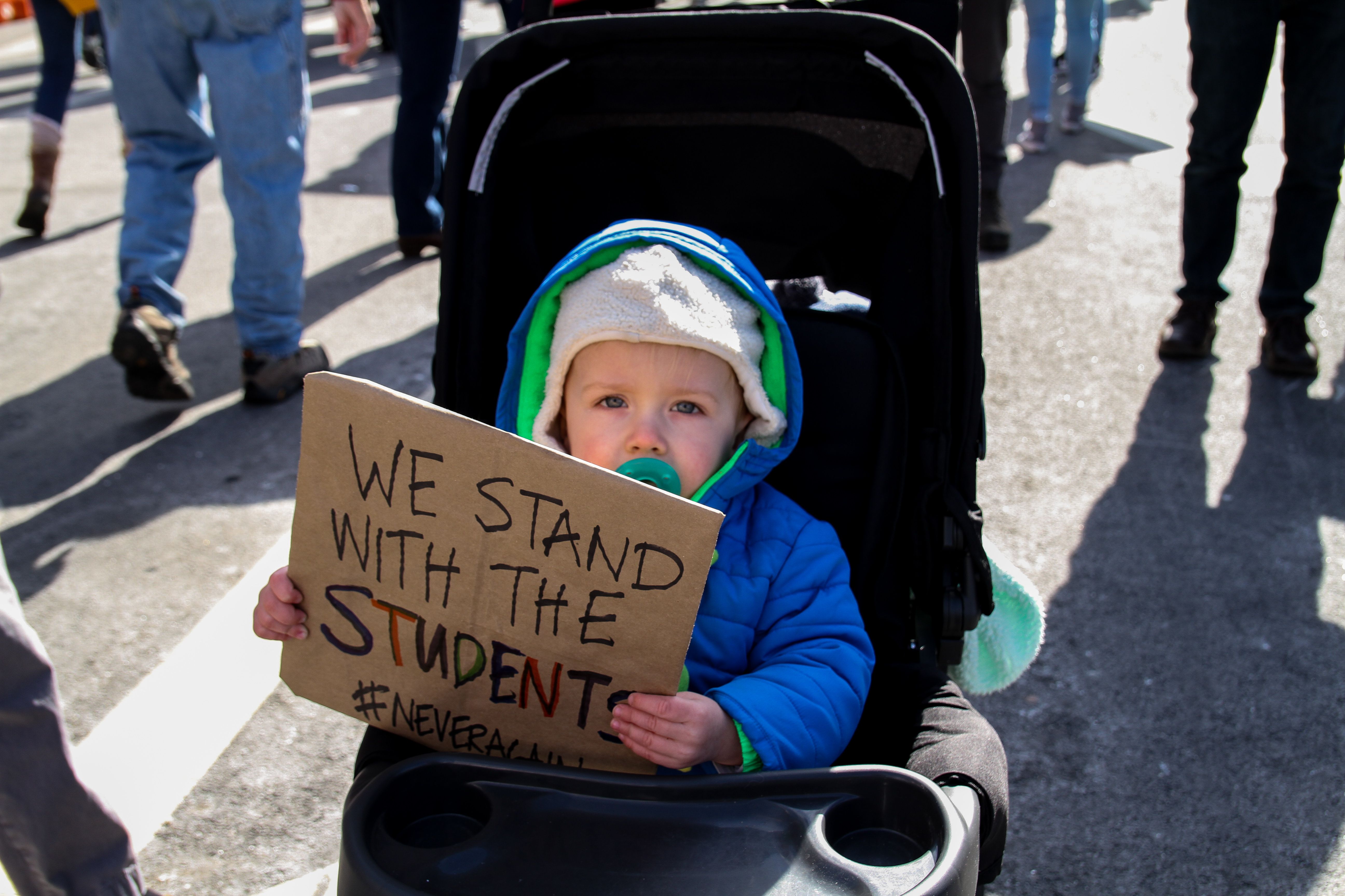Children of all ages showed up to march, or in some cases ride, down Pennsylvania Avenue during March For Our Lives. Image by Alyssa Sperrazza. United States, 2018.