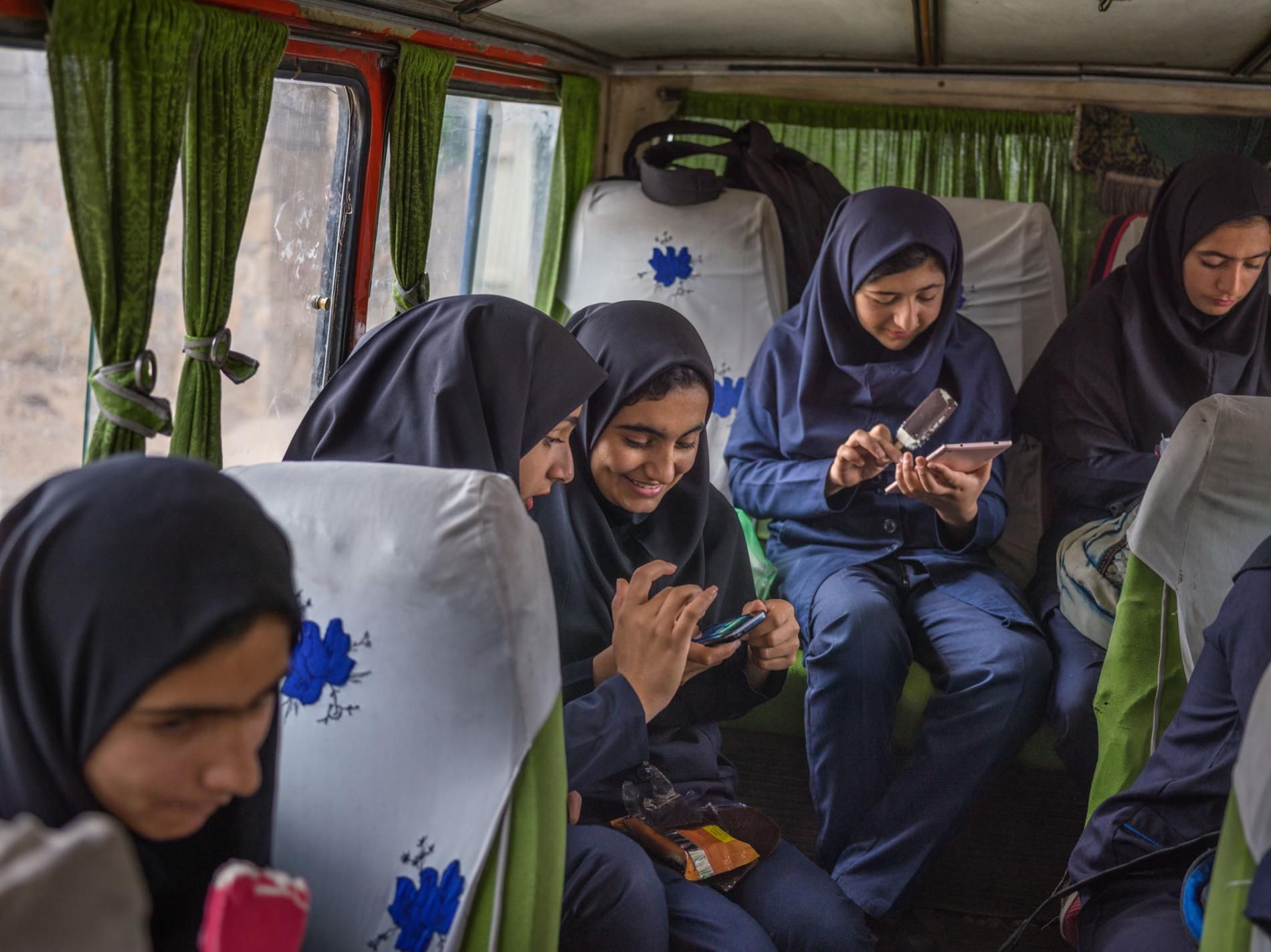 Girls spend nearly two hours en route to Bibi Maryam Boarding School. Most of their families are nomads who move into village houses to enable the students to attend school during the week. Image by Newsha Tavakolian. Iran, 2018.