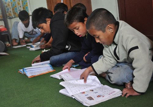 After the suspension of adoption from Nepal, orphanages say their main income source has dried, forcing them to put children out of school because of lack of money. Image by Anup Kaphle. Nepal, 2011.
