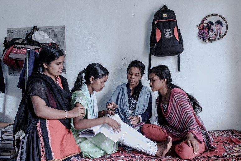 Purnima with her roommates. Image by Arko Datto. India, 2018.