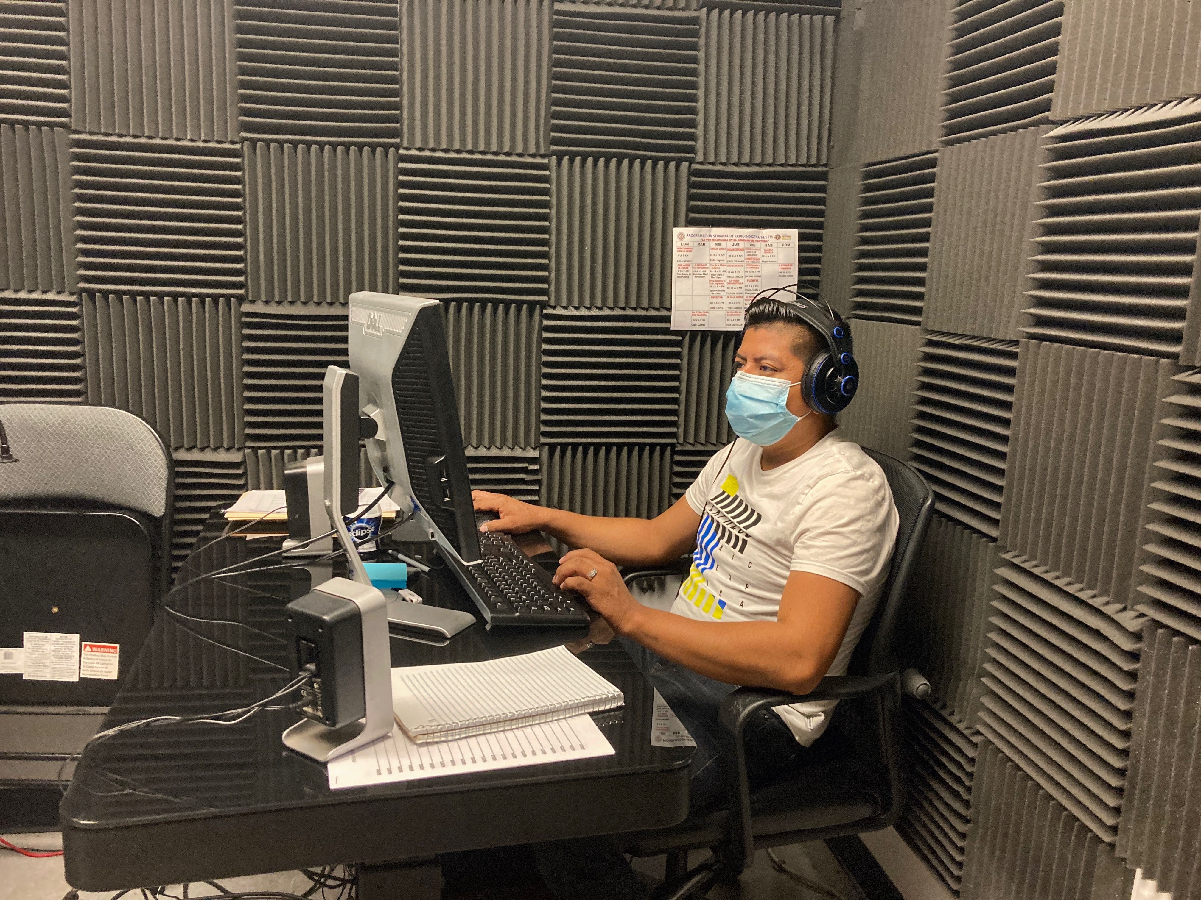 Radio Coordinator Bernardino Almazán works in MICOP's office. Image by Julia Knoerr. United States, 2020.