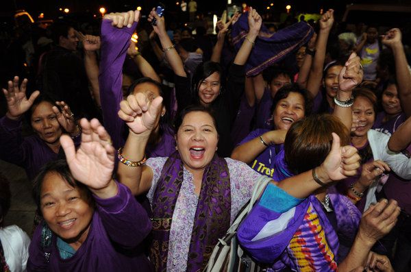 Supporters celebrate passage of the reproductive health bill in the Philippines' House of Representatives in December. Image by Jay Directo / AFP/Getty Images. Philippines, 2012.