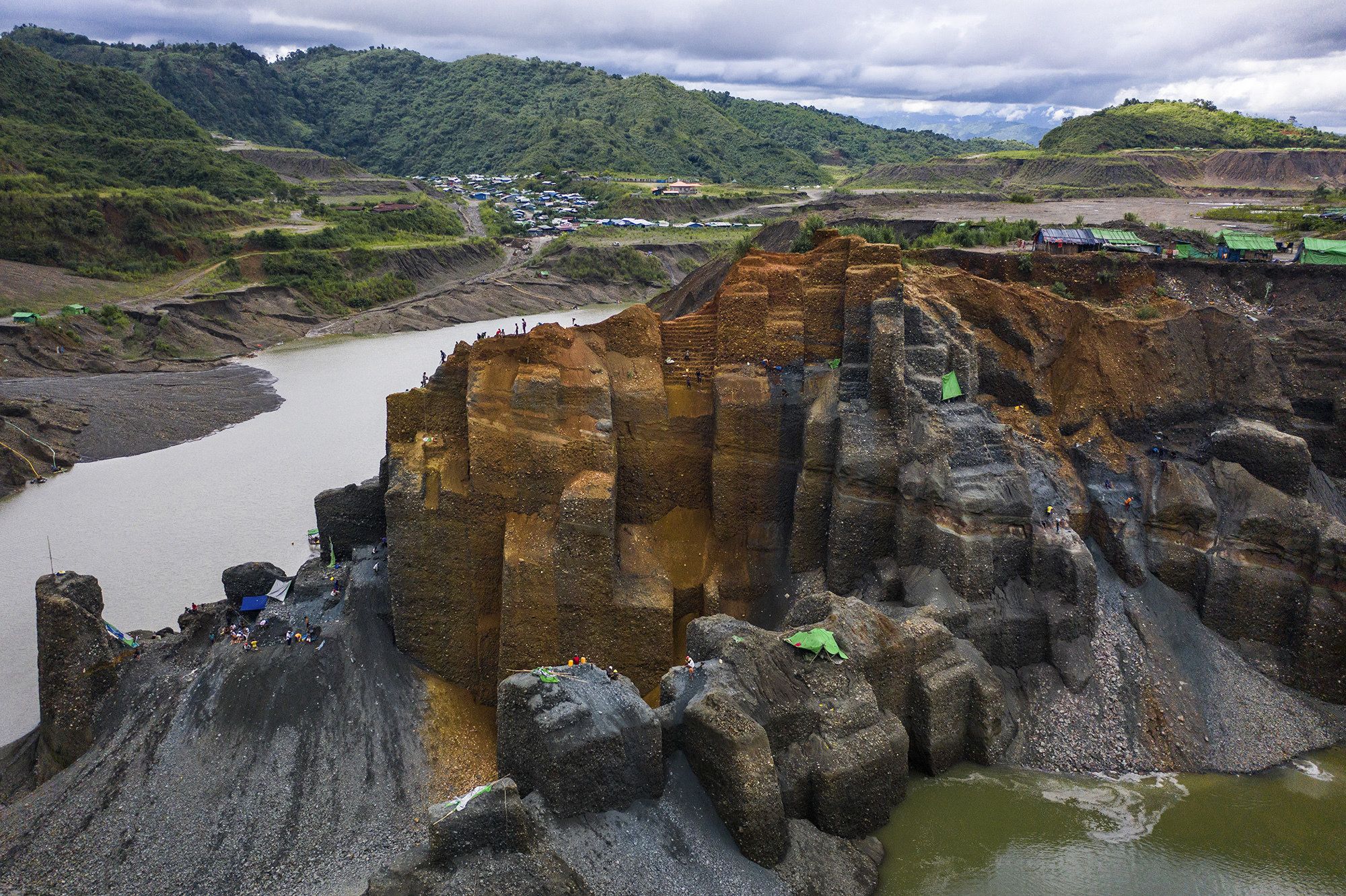 Miners dig for jade on a government-licensed site. Image by Hkun Lat. Myanmar, 2020.