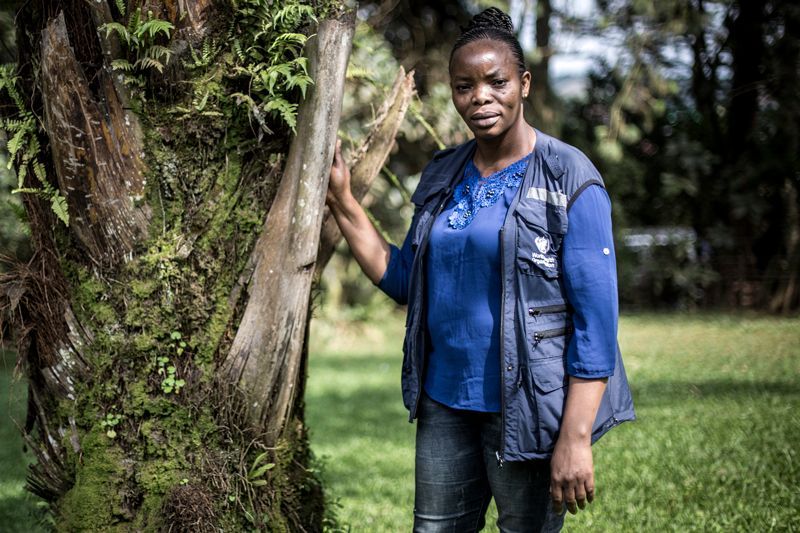 Marie-Claire Kolié, a doctor from Guinea, works at an Ebola treatment centre that has been shot at and set on fire. Image by John Wessels. Democratic Republic of Congo, 2019.