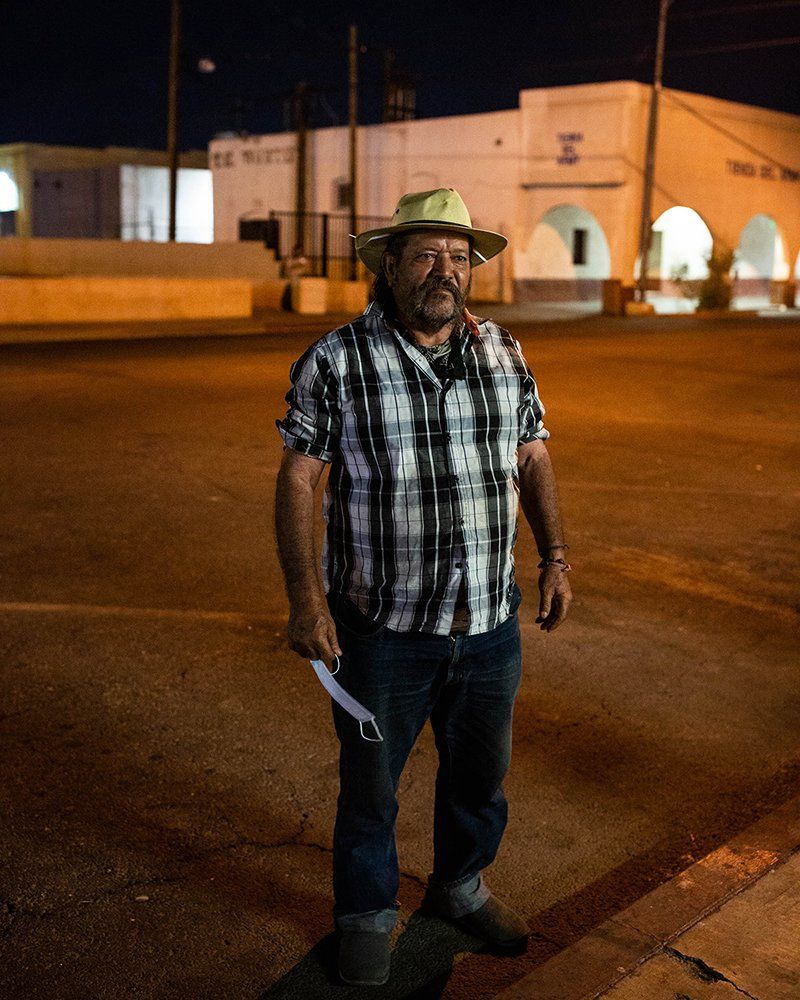 Farmworker Sergio Gomes Macias sleeps on the streets of Calexico, California, about 500 feet from the Mexican border. He says the pandemic has made it hard to find food, water and restrooms since nonessential businesses closed amid high infection rates in Imperial County. Image by Anna Maria Barry-Jester/KHN. United States, 2020.
