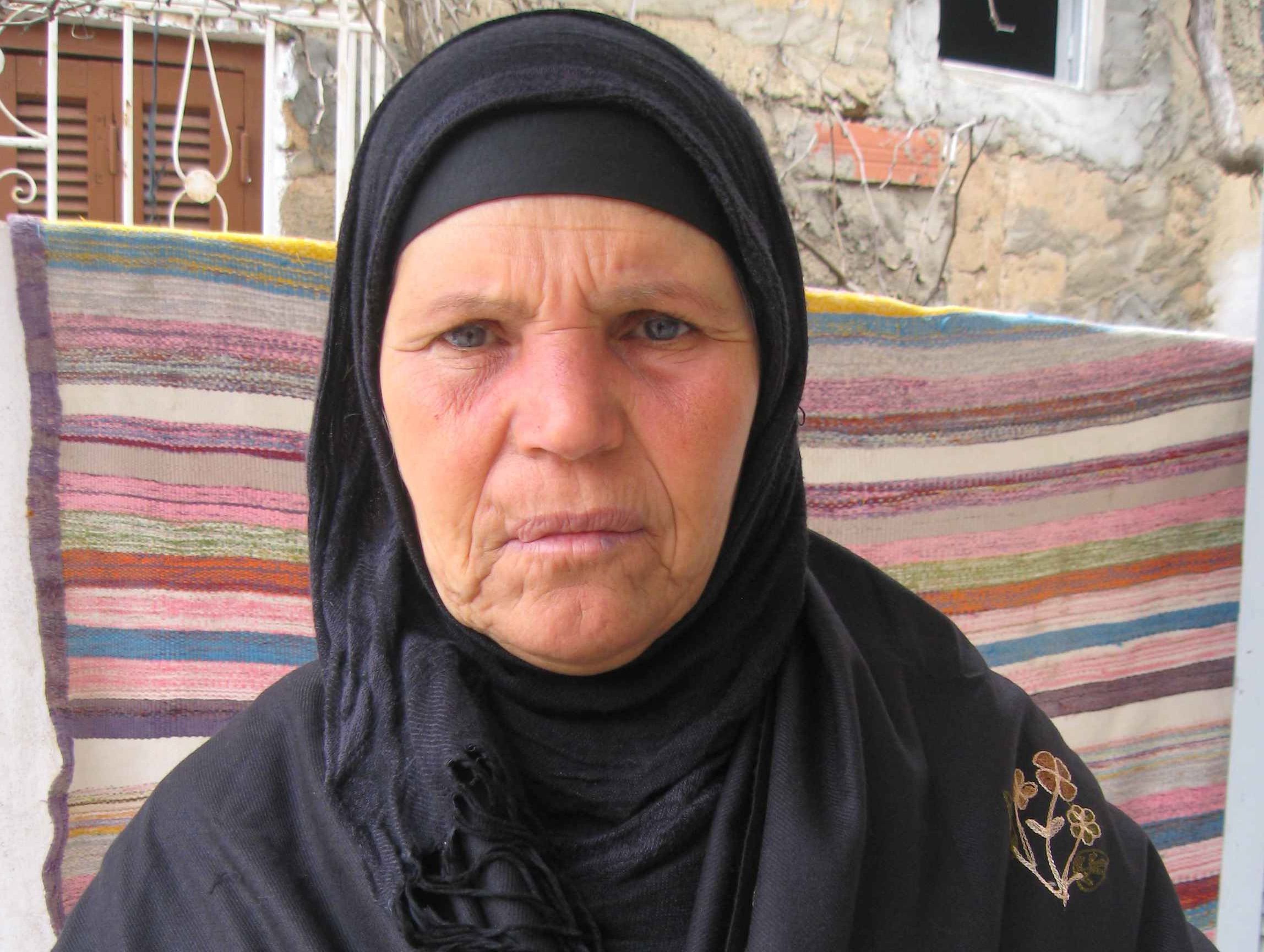 Mohammed Bouazizi's mother. Image by Ellen Knickmeyer. Tunisia, 2011.