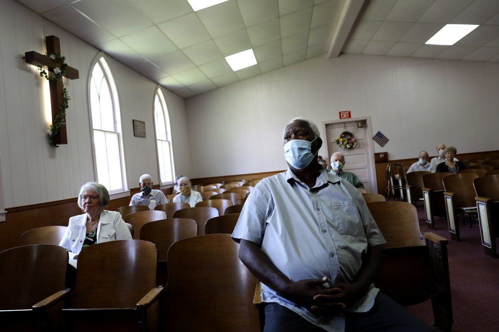 Milton L. McDaniel, Sr., attends a service at Boskydell Baptist Church in Carbondale, Ill. Image by Wong Maye-E/AP Photo. United States, 2020.