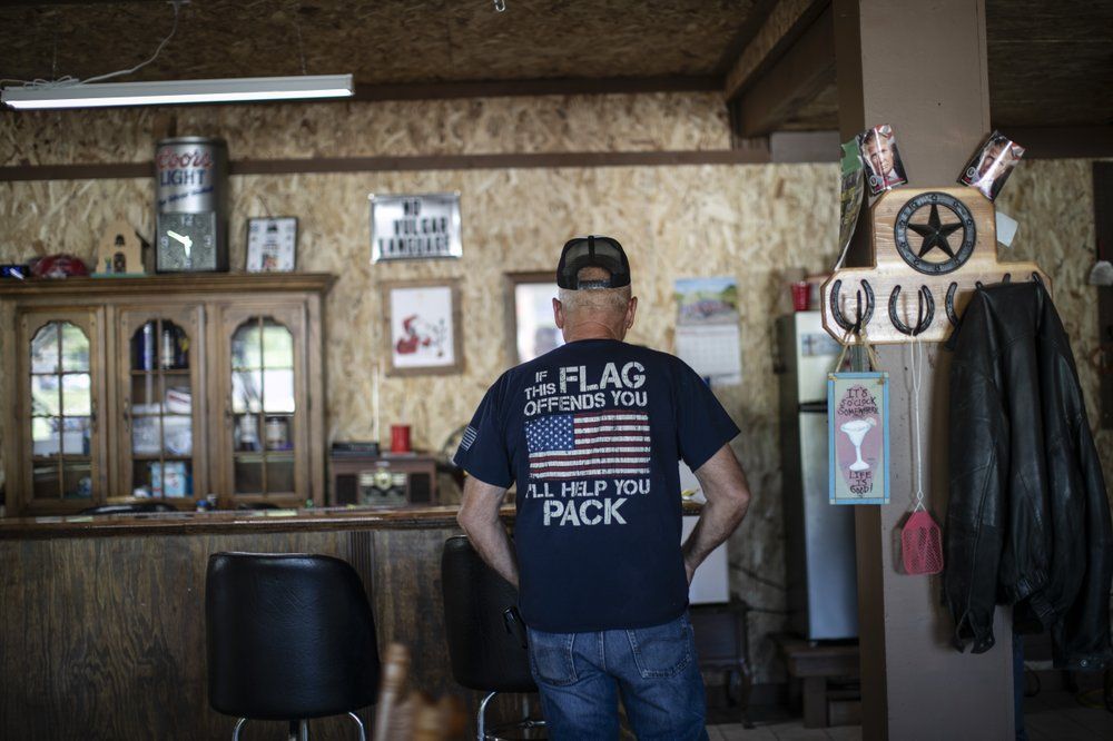 Bill Stevens, 76, stands inside the clubhouse in West Vienna, Ill. Image by Wong Maye-E/AP Photo. United States, 2020.