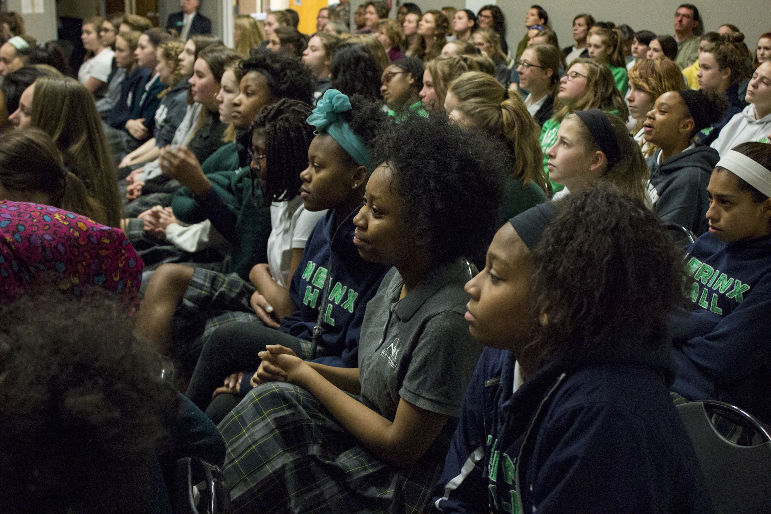 Students welcome speakers Jon Sawyer, Madeleine Albright and Stephen Hadley for a campus-wide Q&A at Nerinx Hall High School in St. Louis, Missouri. Image by Lauren Shepherd, United States, 2017.