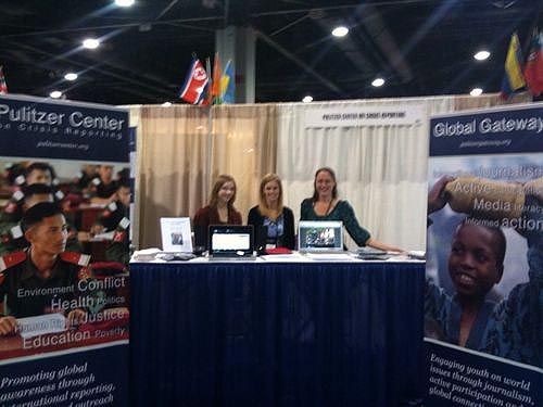  Tatum, Janeen and Nathalie at the Pulitzer Center's NCSS booth.