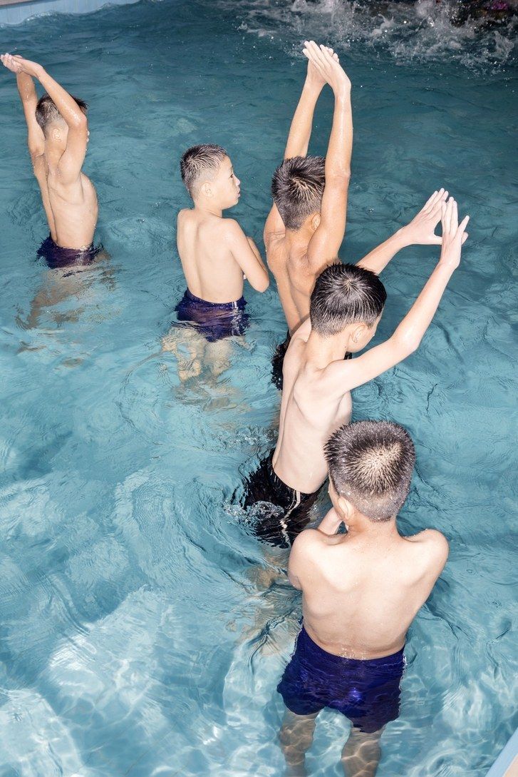 After-school swimming lessons at the Pyongyang Orphans’ Secondary School. Image by Max Pinckers/The New Yorker. North Korea, 2017.