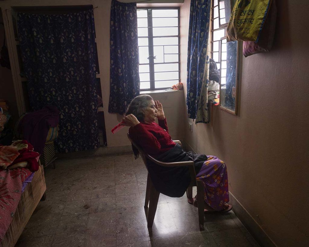 Rohit says his mother started developing restricted breathing symptoms 10 years ago. She used to go out for short walks but now that Patna is so highly polluted, she’s housebound. Image by Larry C. Price. India, 2018.