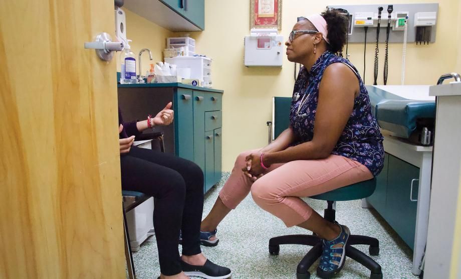 The Trials of Routine Care: Physician assistant Shantae Rodriguez says routine pap smears are among the most triggering of medical procedures for survivors of sex trafficking. Image by Isabella Gomes. United States, 2019.