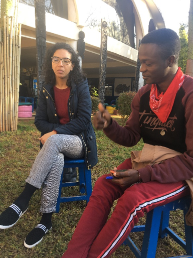 A picture of Omar, the 16-year-old from Cameroon and Aisha, the translator who made the interviews possible. Image by Megan Pierce. Morocco, 2019.