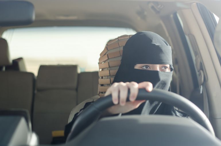 Woman driving in Saudi Arabia. Image by Shutterstock. Saudi Arabia, 2018. 