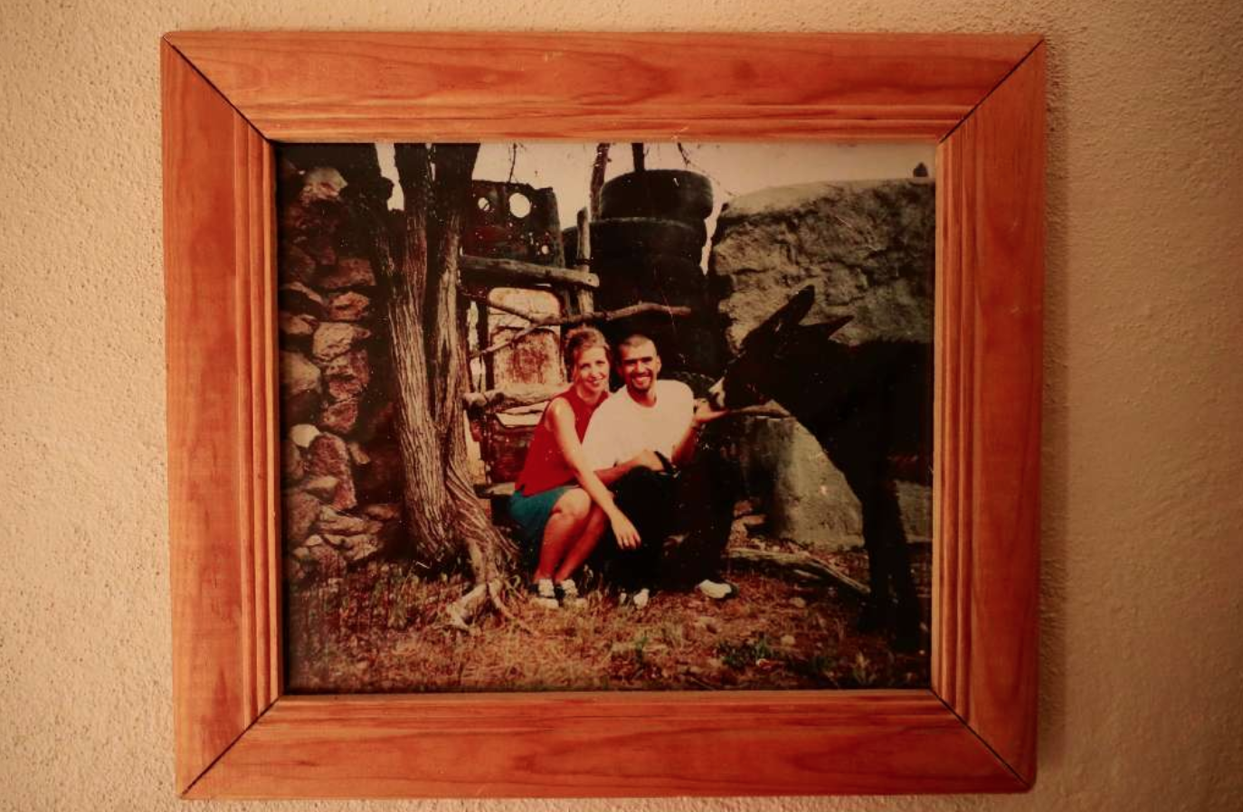 In their Zacatecas house, a framed photo of Joy and Rafael records one of their early trips to his grandfather’s farm outside the city. Image by Erika Schultz. Mexico, 2019. 
