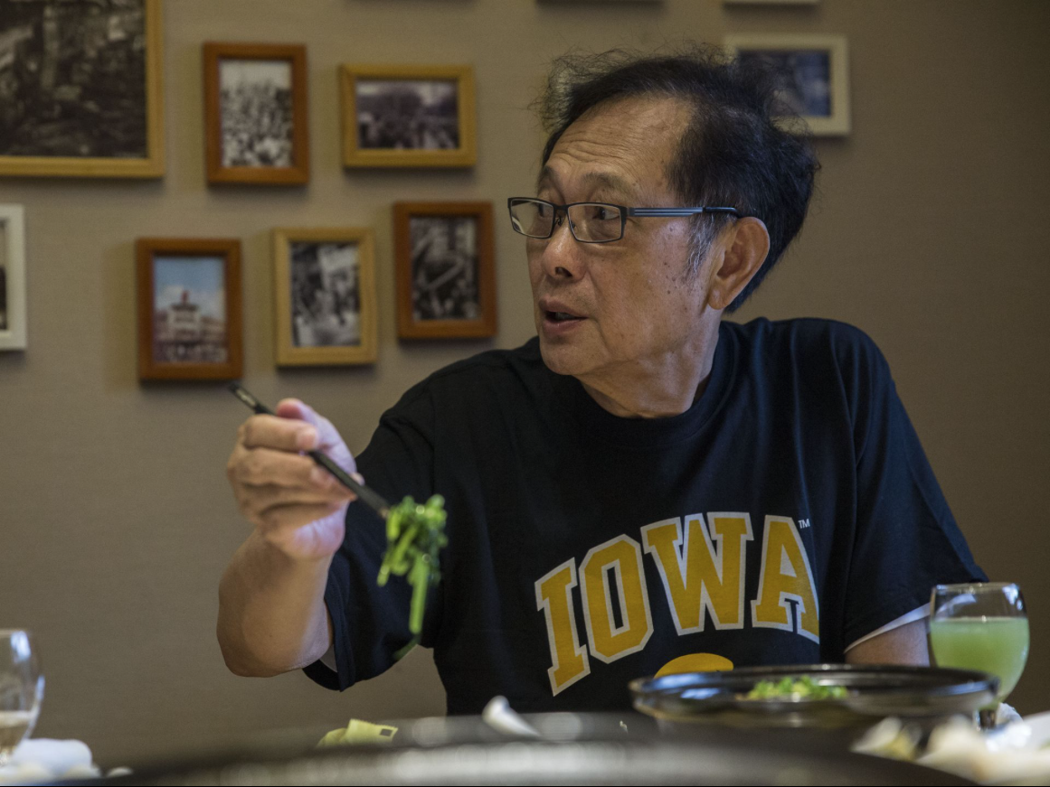 Michael Lee, owner of the Hamburg Inn No. 2 in Iowa City, eats lunch during a visit to Taizhou, China, on Friday, Sept. 29, 2017. Lee plans to expand his business, encompassing both food and education, to China with headquarters in Taizhou, south of Shanghai. Image by Kelsey Kremer, China, 2017.