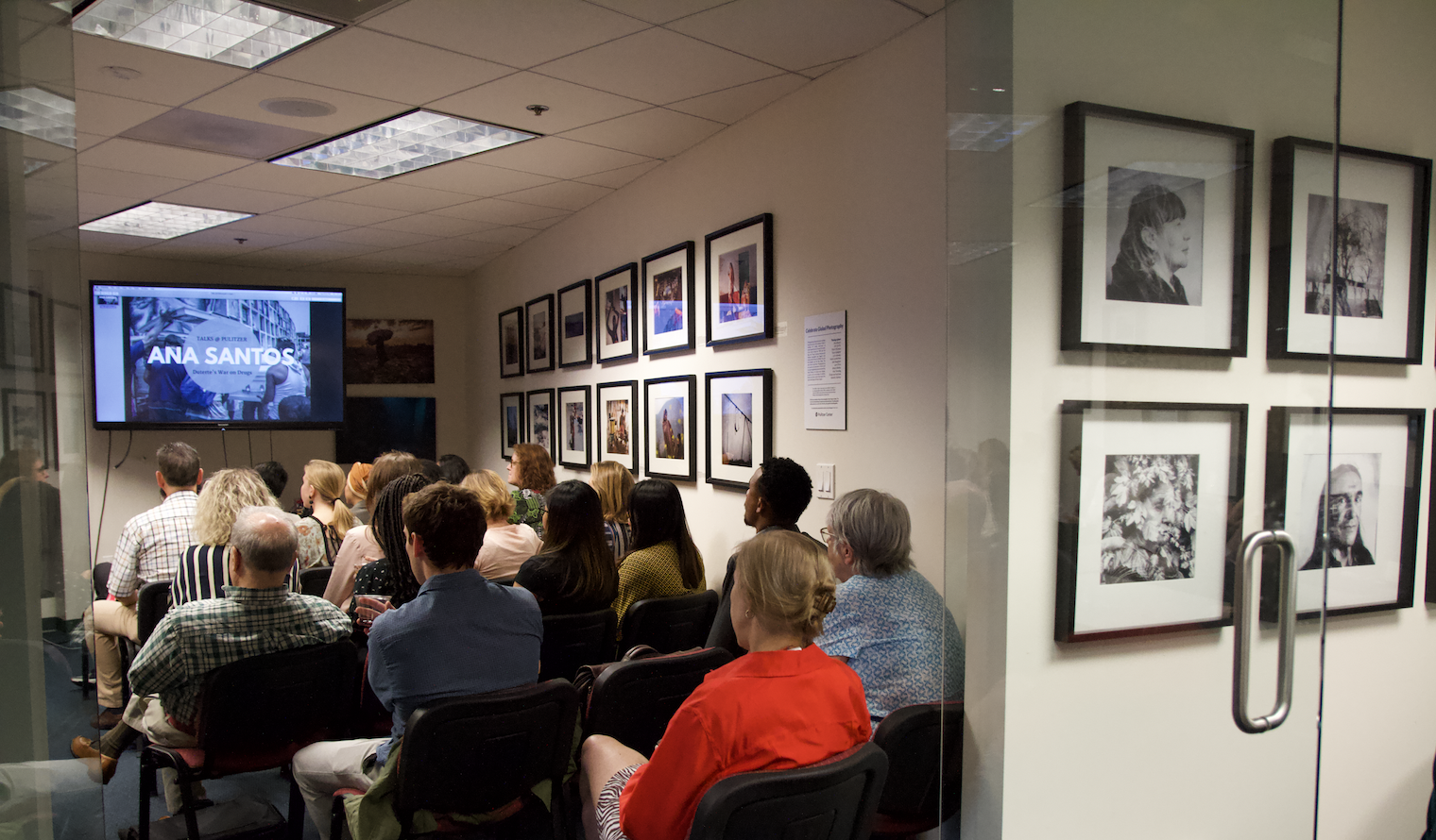 Talks @ Pulitzer audience listens as journalist Ana Santos is introduced. Image by Kate Karstens. United States, 2018.