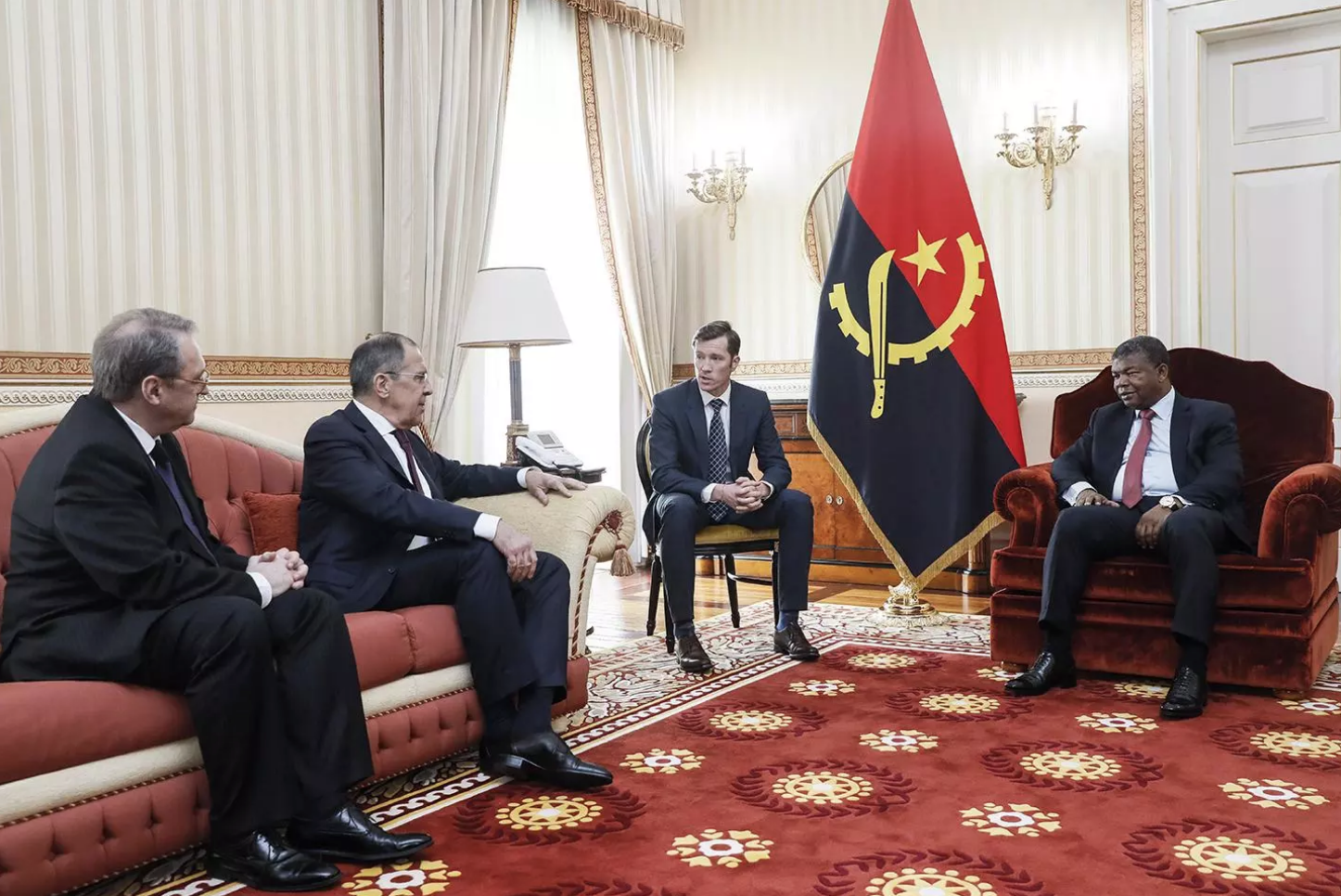 Russian Foreign Minister Sergei Lavrov, second from left, meets with Angolan President Joao Lourenco. Image by Alexander Shcherbak. Angolan, 2018. 