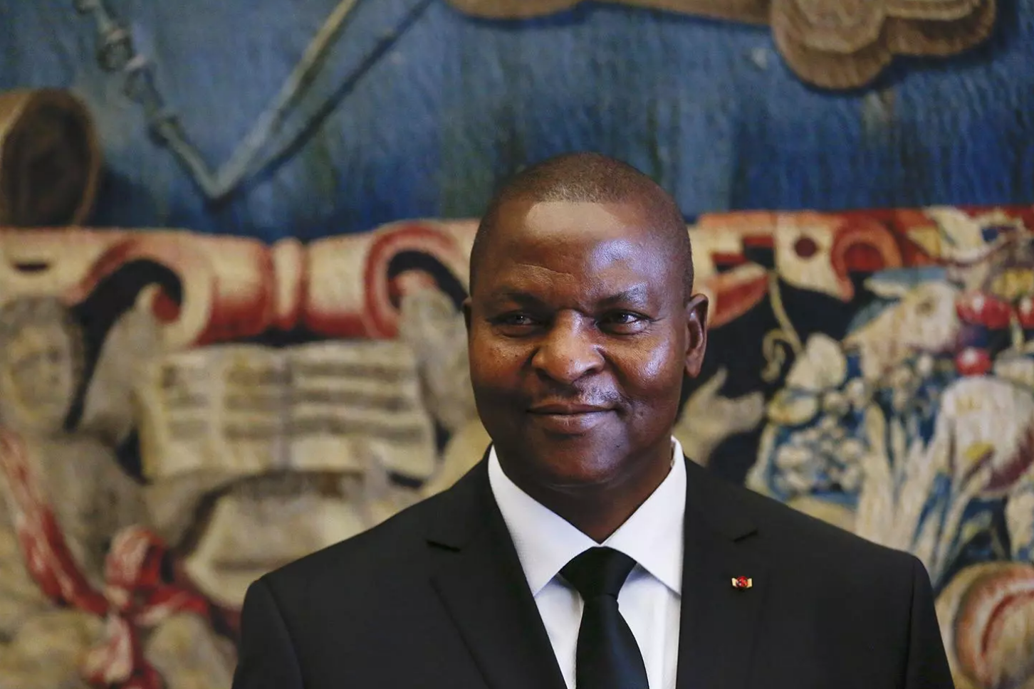 Faustin-Archange Touadéra, president of the Central African Republic, attending a meeting at the Vatican. Image by Alessandro Bianchi. Vatican City, 2018. 
