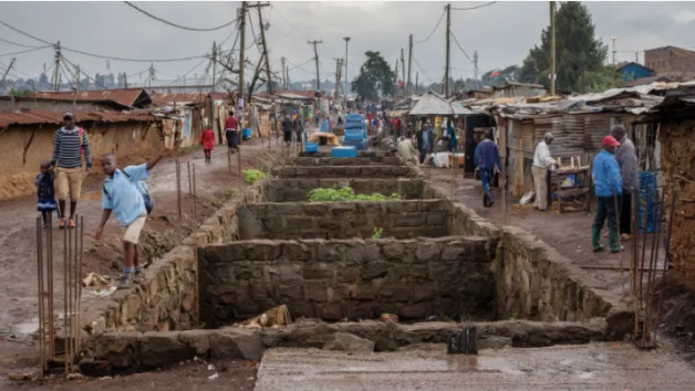 Unfinished section of Kenya Railway housing in Kibera, Nairobi, Kenya. Image by Peter DiCampo. 2018.