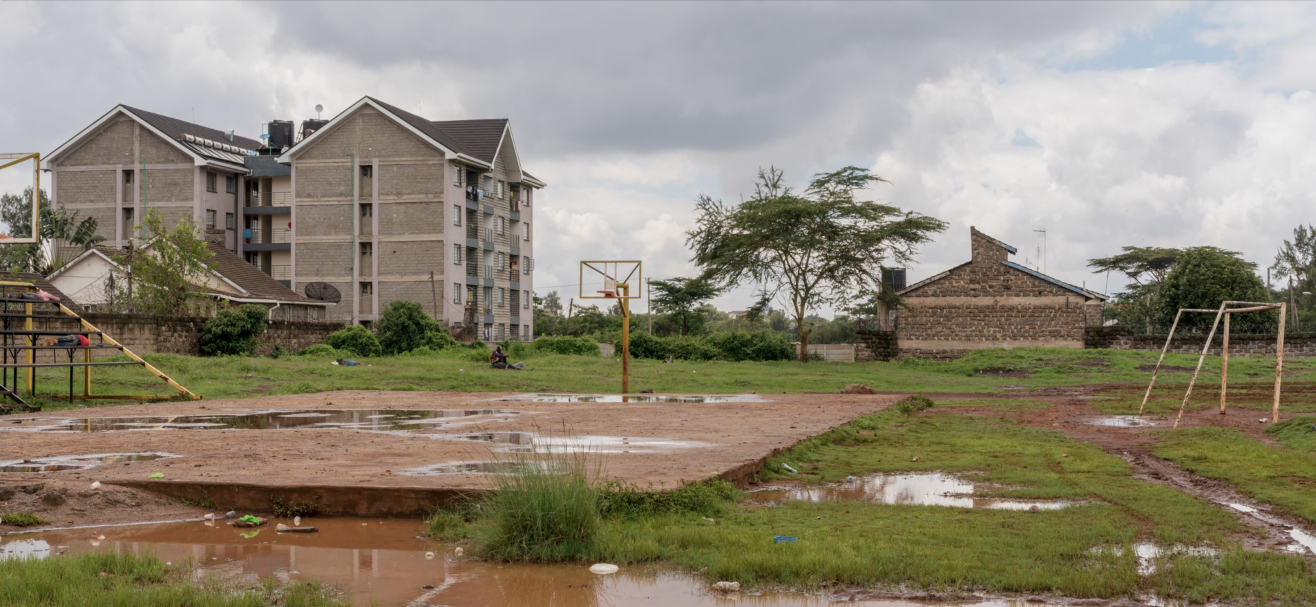 Dilapidated Woodley Field, a former playground and stadium ground, in Nairobi. The projected was reported to the What Went Wrong? survey by several Kibera residents. Image by Peter DiCampo. Kenya, 2018.