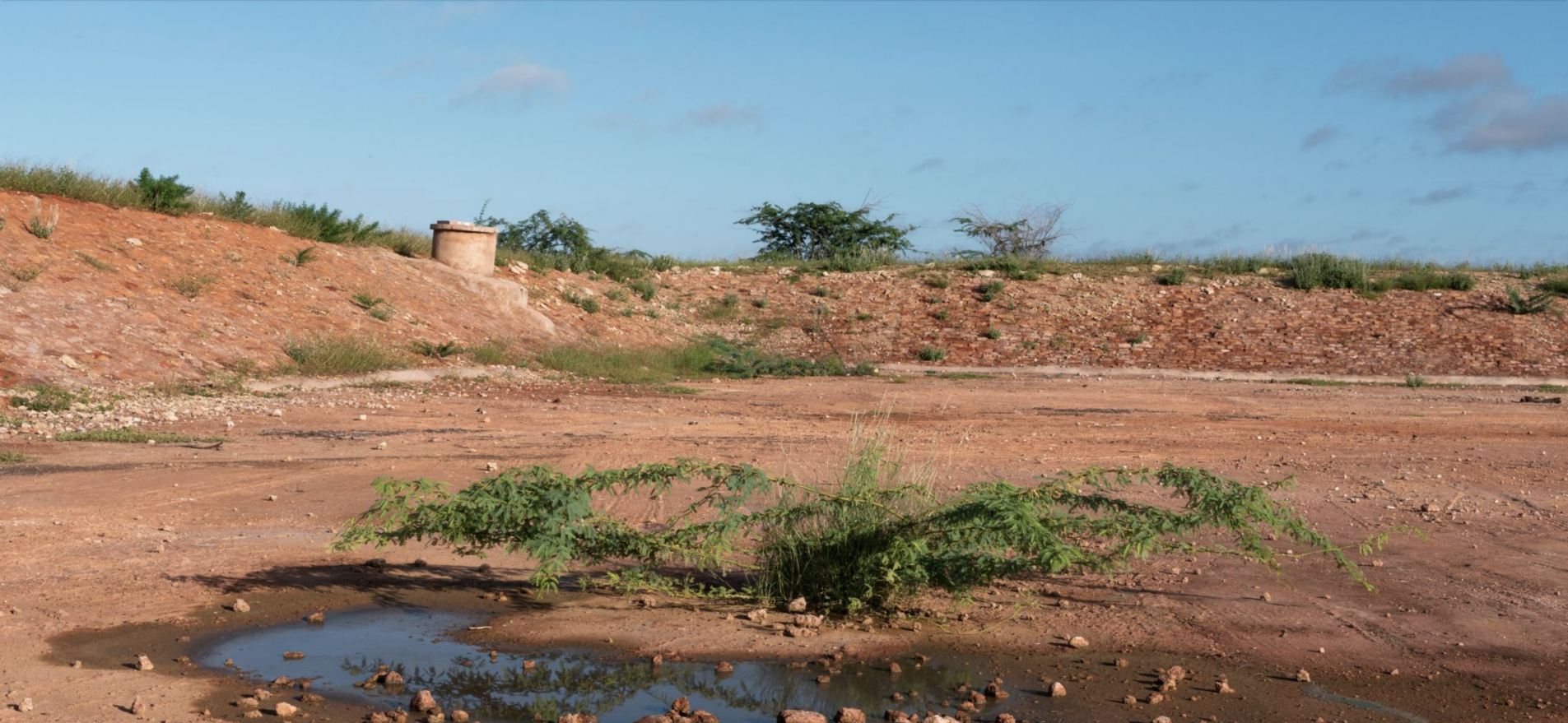 The site of a massive, incomplete sewage project in Wajir. The project, financed by the Ministry of State for Development of Northern Kenya and Other Arid Regions, started and stalled in the early 2000s. It was reported several times to the What Went Wrong? survey. Image by Peter DiCampo. Kenya, 2018.